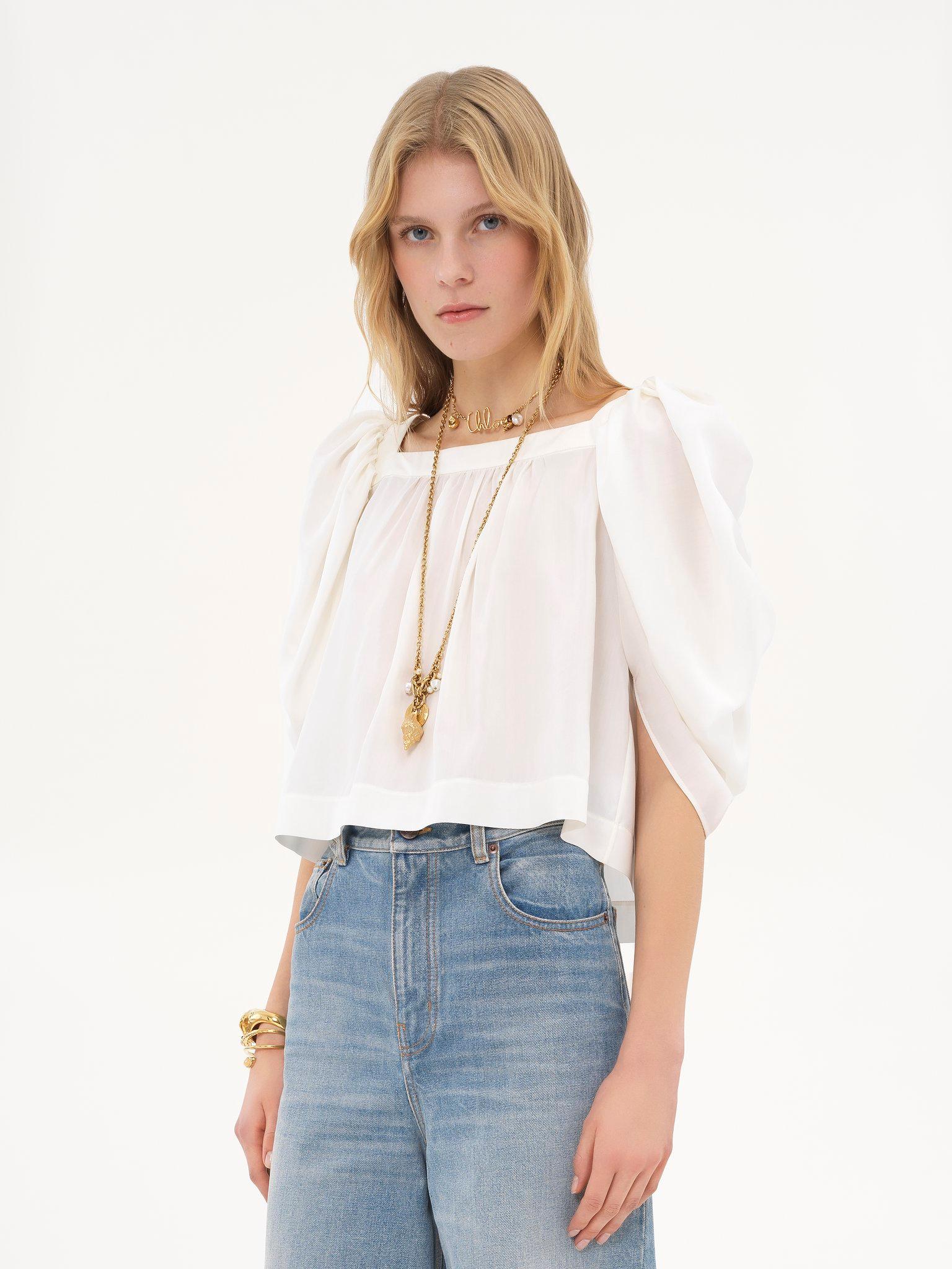 Puff-sleeve pleated top in silk poplin Product Image