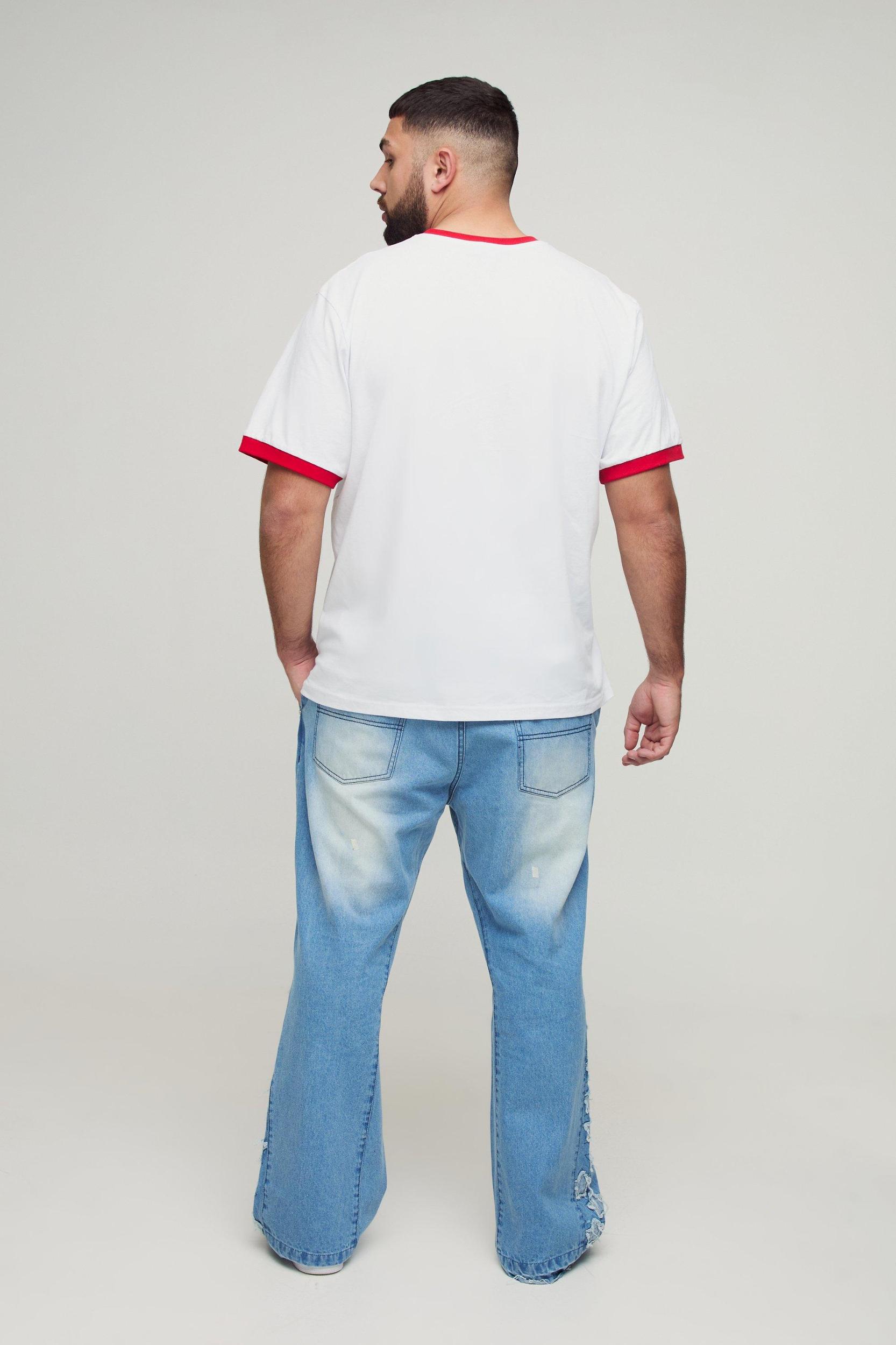 Plus Star Applique Gusset Distressed Flared Jeans | boohooMAN USA Product Image