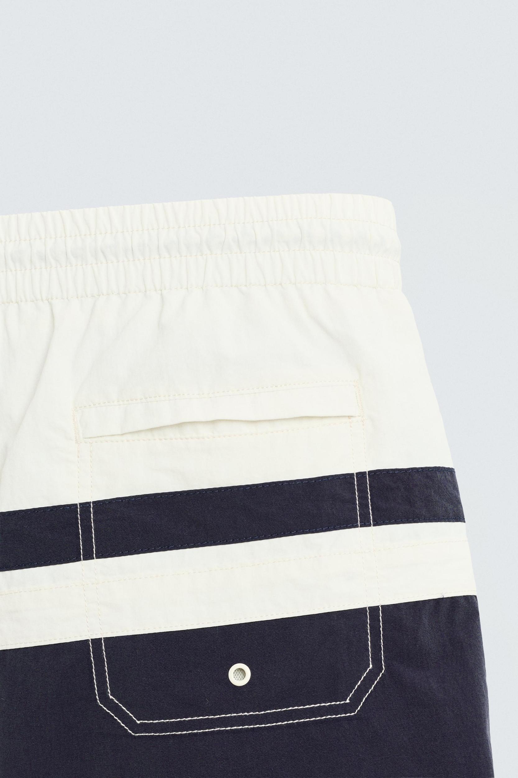 COLOR BLOCK LONG SWIMSUIT Product Image