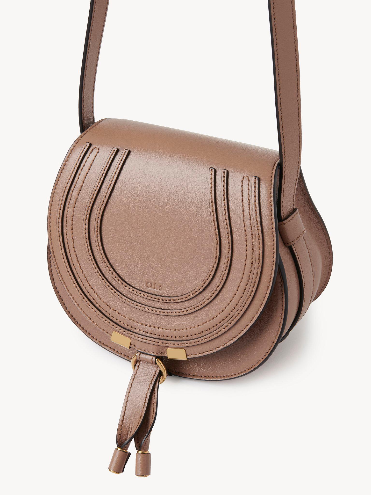 Small Marcie saddle bag in shiny leather Product Image
