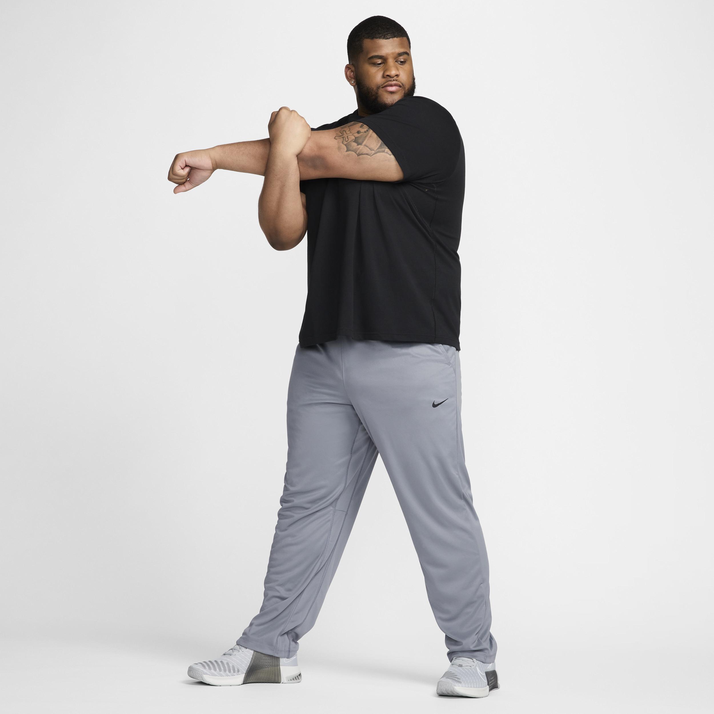 Nike Mens Totality Dri-FIT Open Hem Versatile Pants | FB7507-084 Product Image
