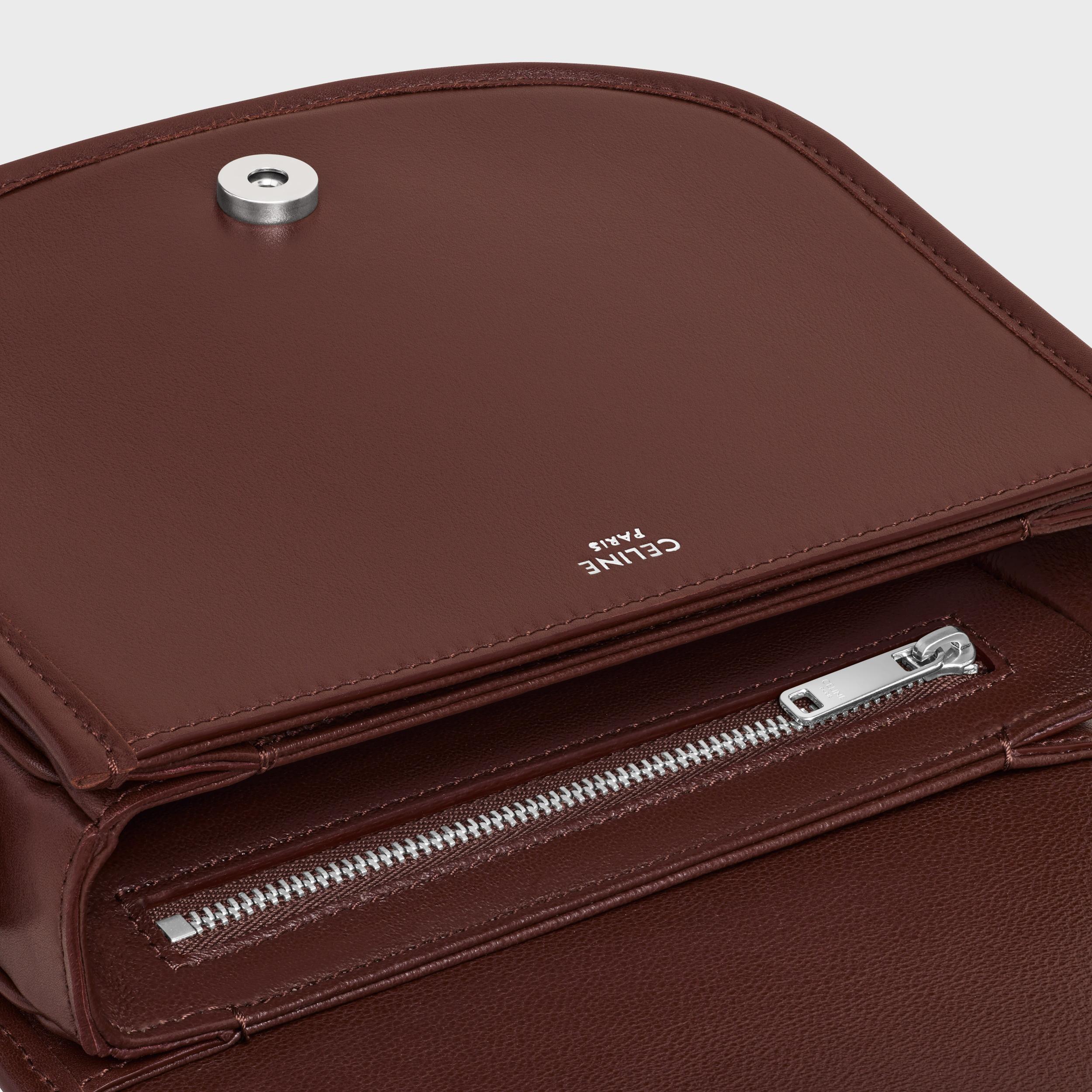 SMALL BESACE STRAP TRIOMPHE IN SUPPLE NATURAL CALFSKIN Product Image