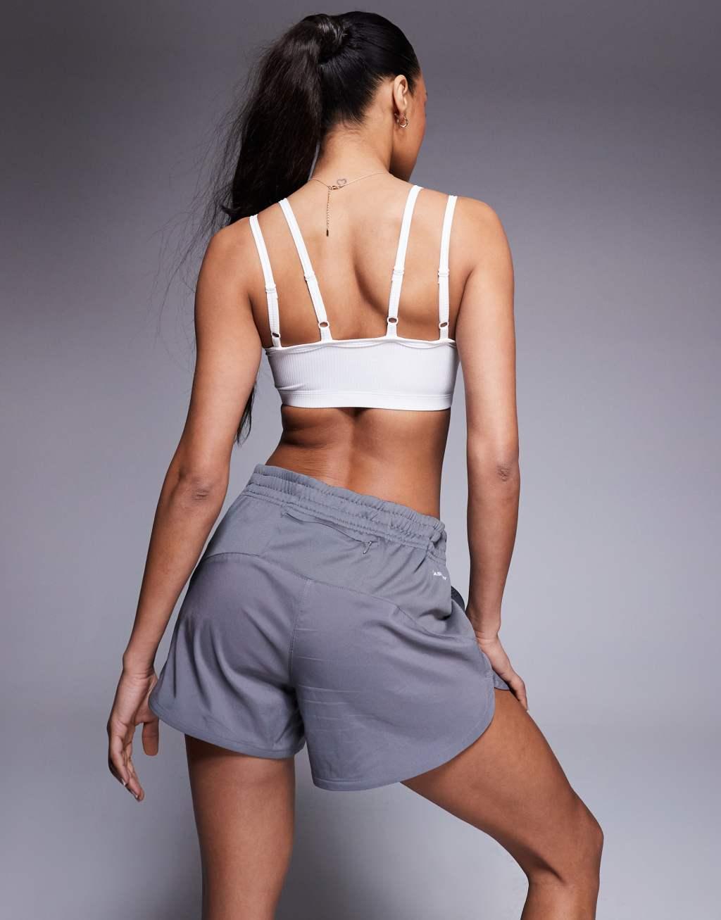 4505 soft touch rib knit light support sports bra with adjustable straps in white  Product Image