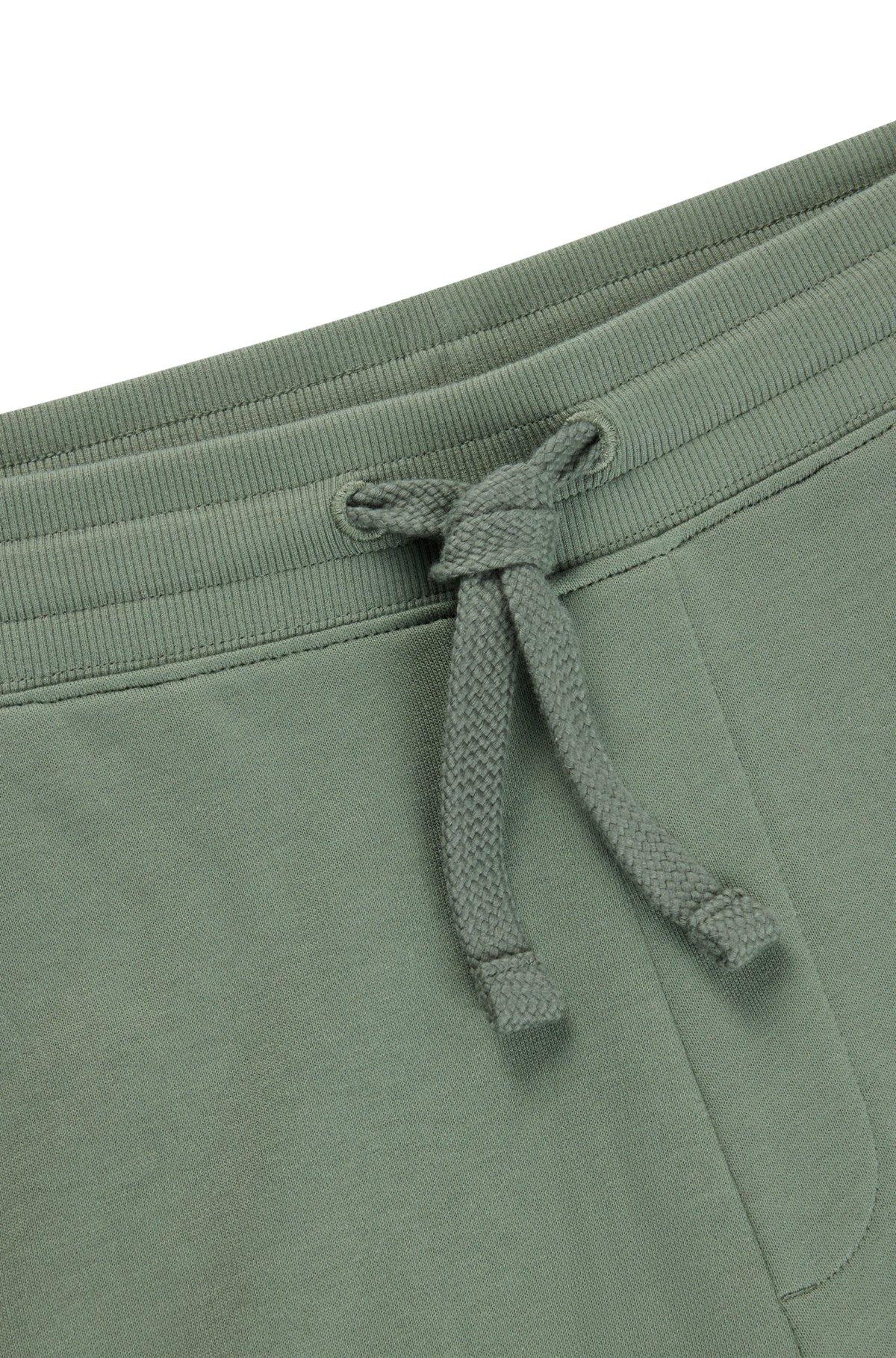 Cuffed tracksuit bottoms in cotton terry with logo print Product Image