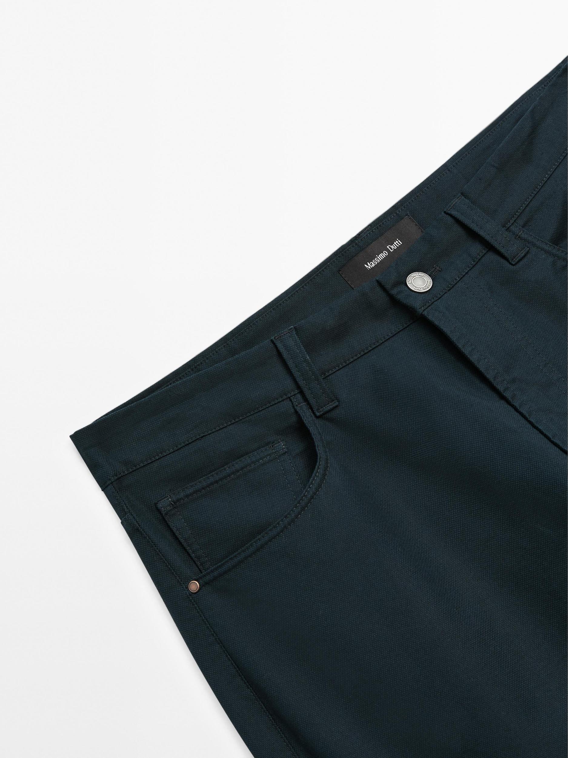 Lightweight tapered fit denim-effect trousers Product Image