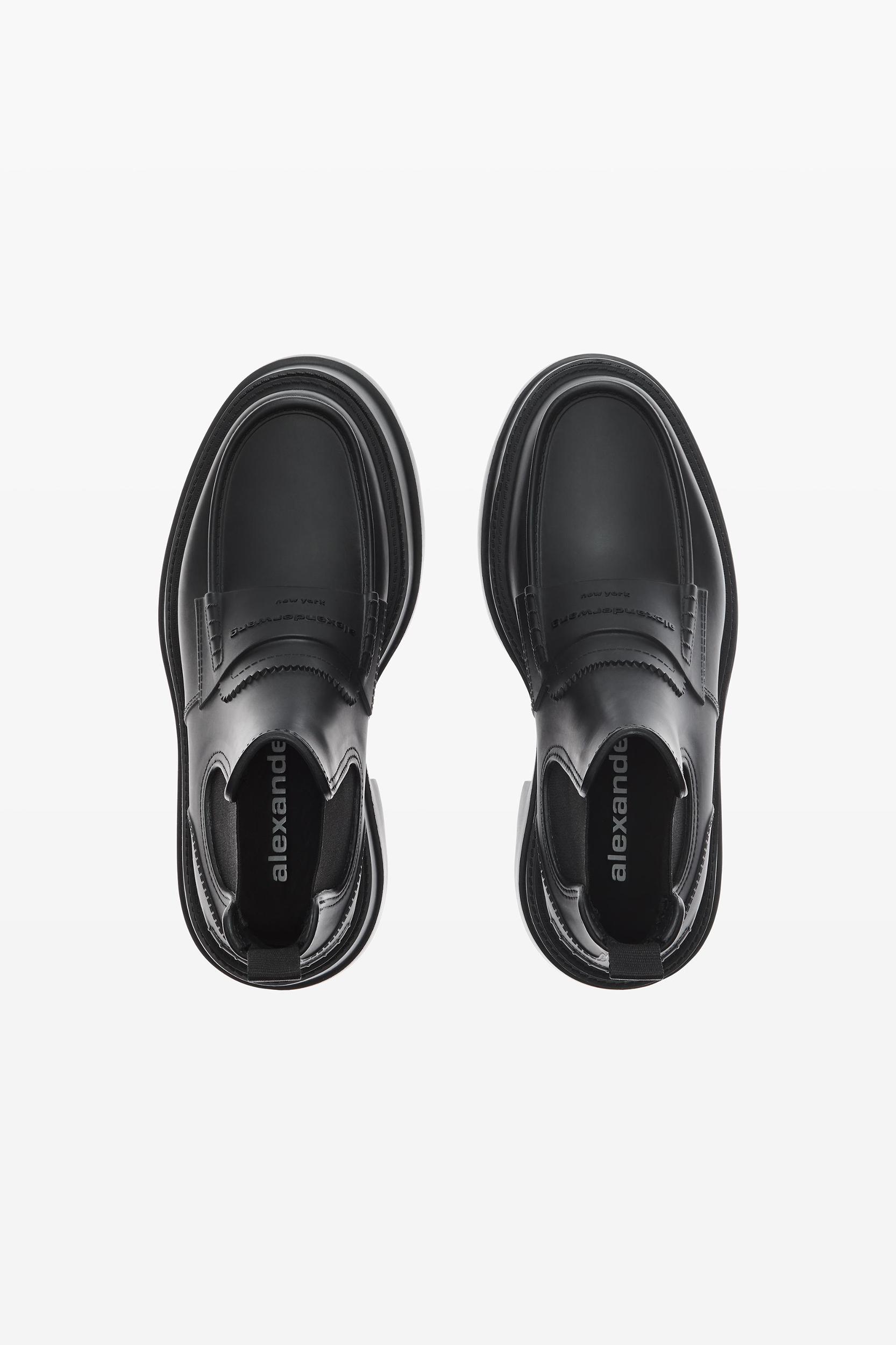 Carter 75mm Ankle Platform Boot In Rubber Product Image