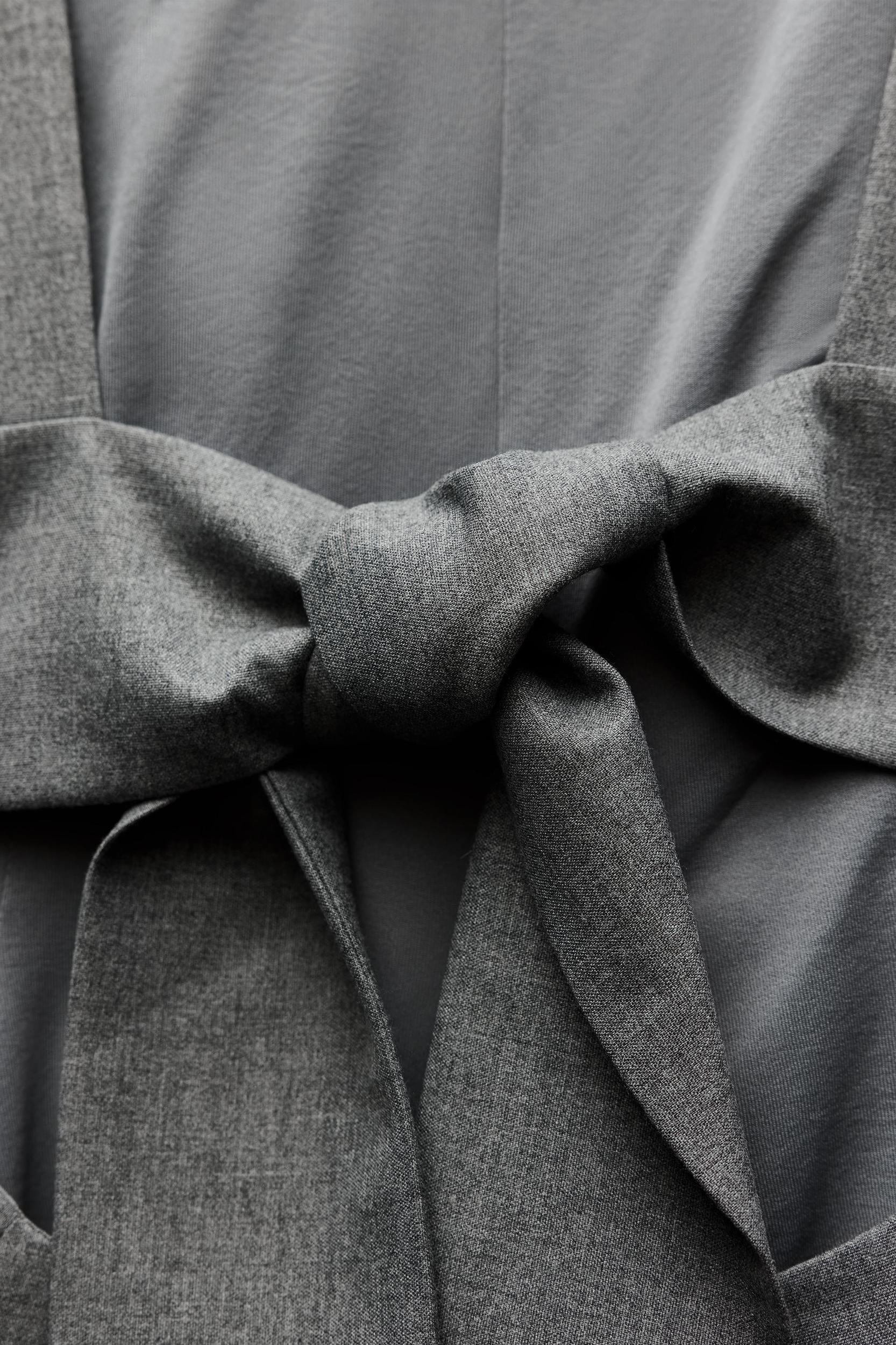 PEPLUM BOW TOP Product Image