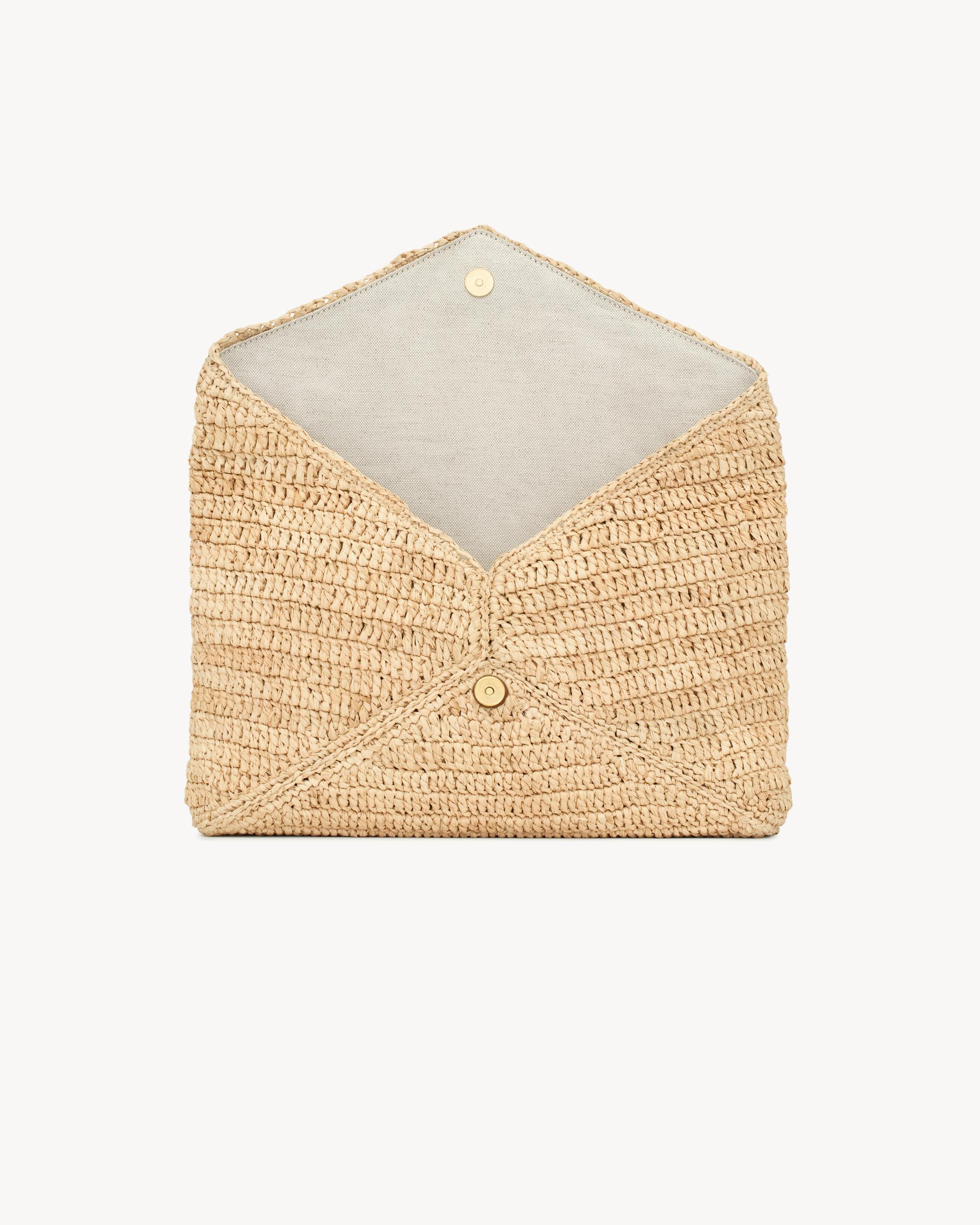 CASSANDRE large envelope pouch in raffia Product Image