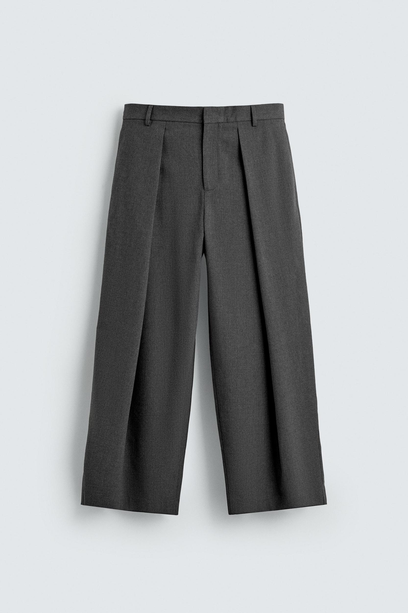 PLEATED WIDE FIT PANTS Product Image