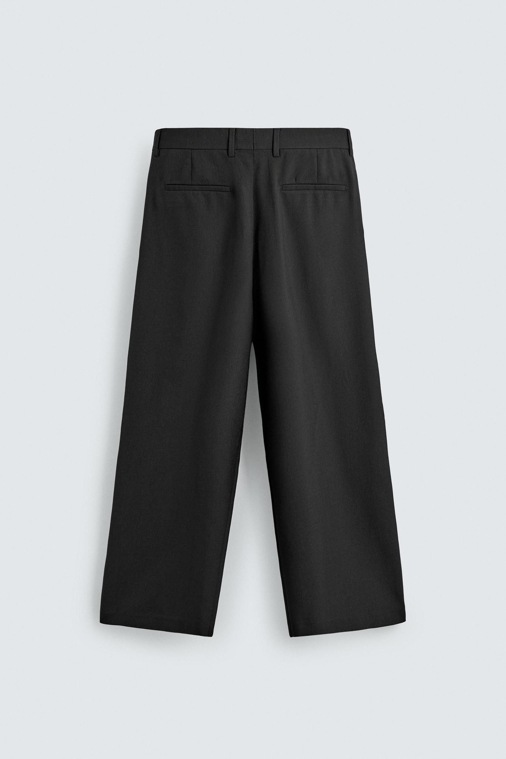 RELAXED FIT PLEATED PANTS Product Image