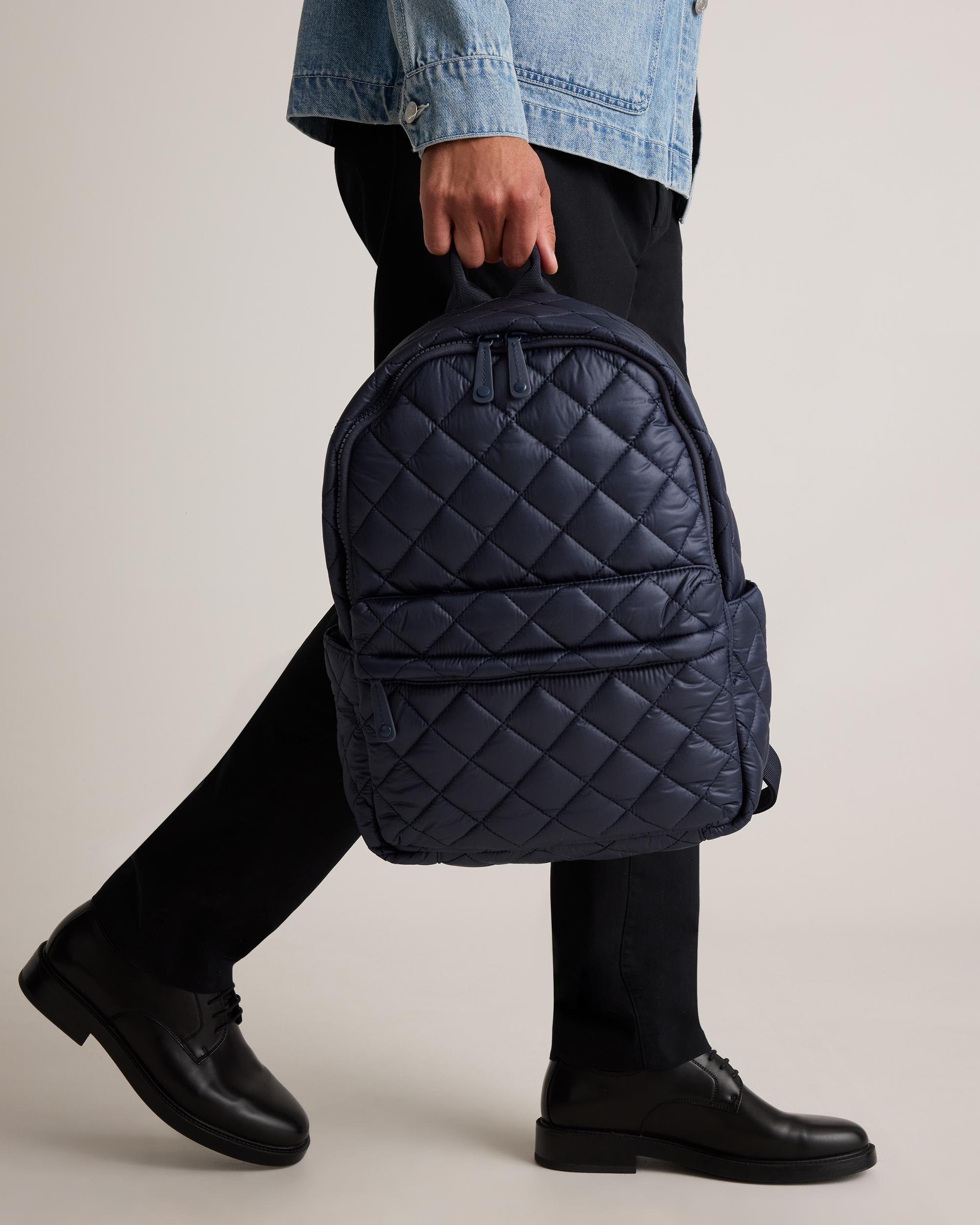 Quince | Women's Transit Quilted Commuter Backpack in Navy, Nylon Product Image