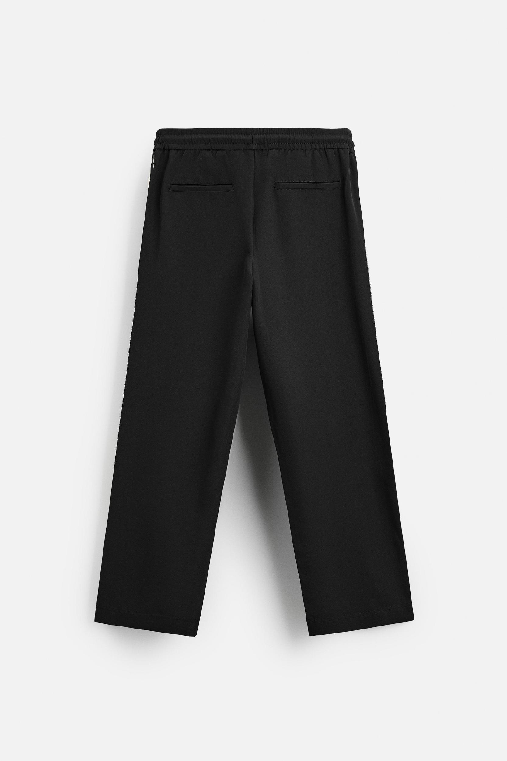 TECHNICAL PANTS WITH BANDS Product Image