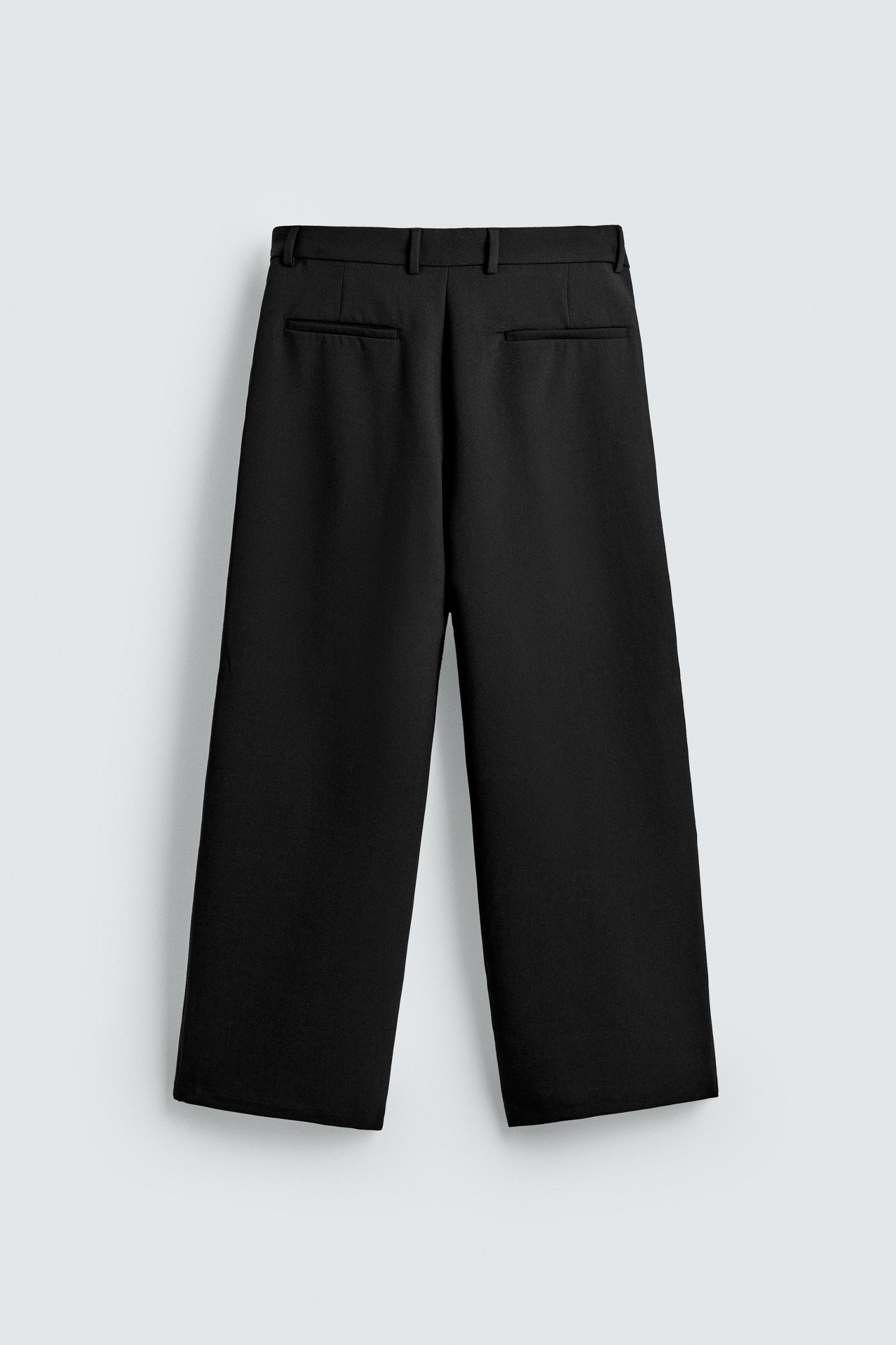 RELAXED FIT PLEATED PANTS Product Image
