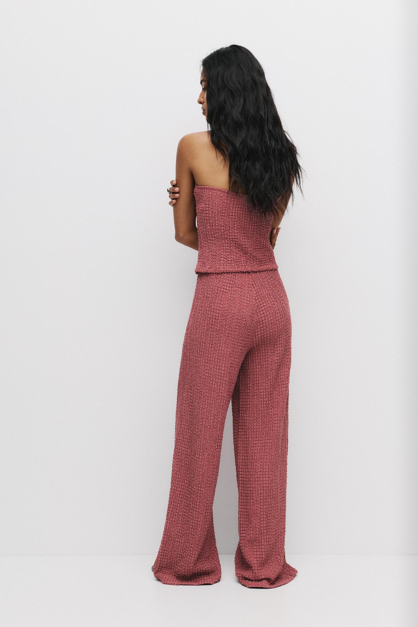 Rustic creased-effect pants Product Image