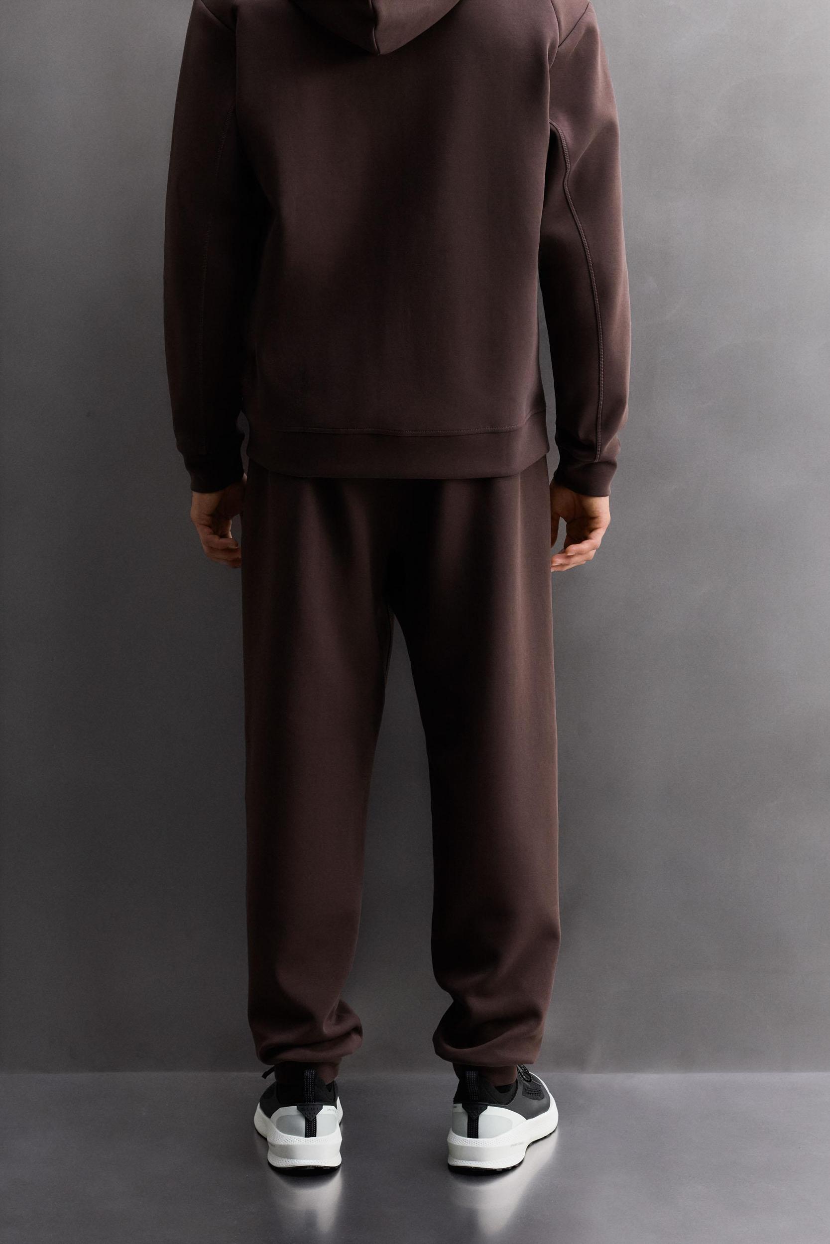 TECHNICAL ZIPPER PANTS Product Image