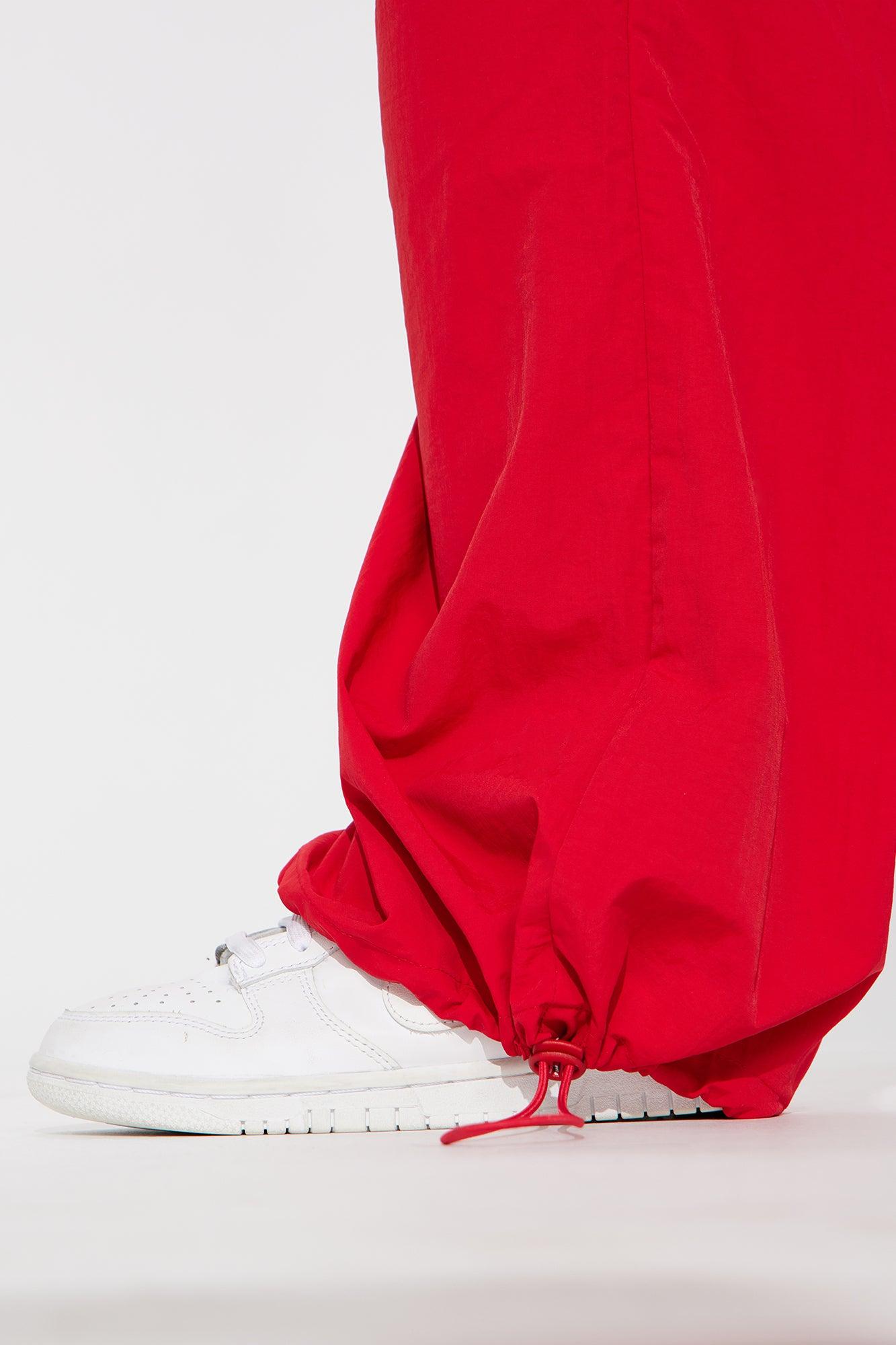 Making Moves Windbreaker Track Pant - Red Female Product Image