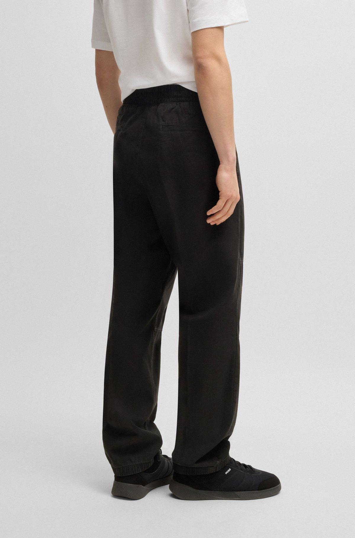Tapered-fit tracksuit bottoms in ripstop cotton Product Image