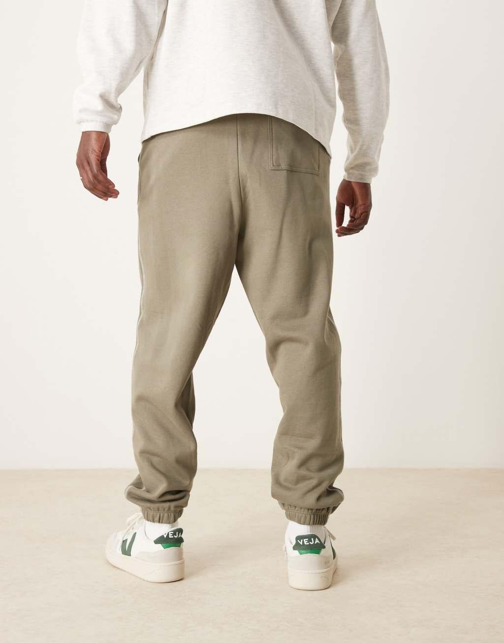 ASOS DESIGN oversized sweatpants with contrast stitching in khaki Product Image