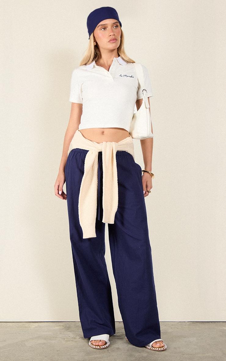 Cream Embroidered Le Marche Logo Fitted Polo Top Product Image