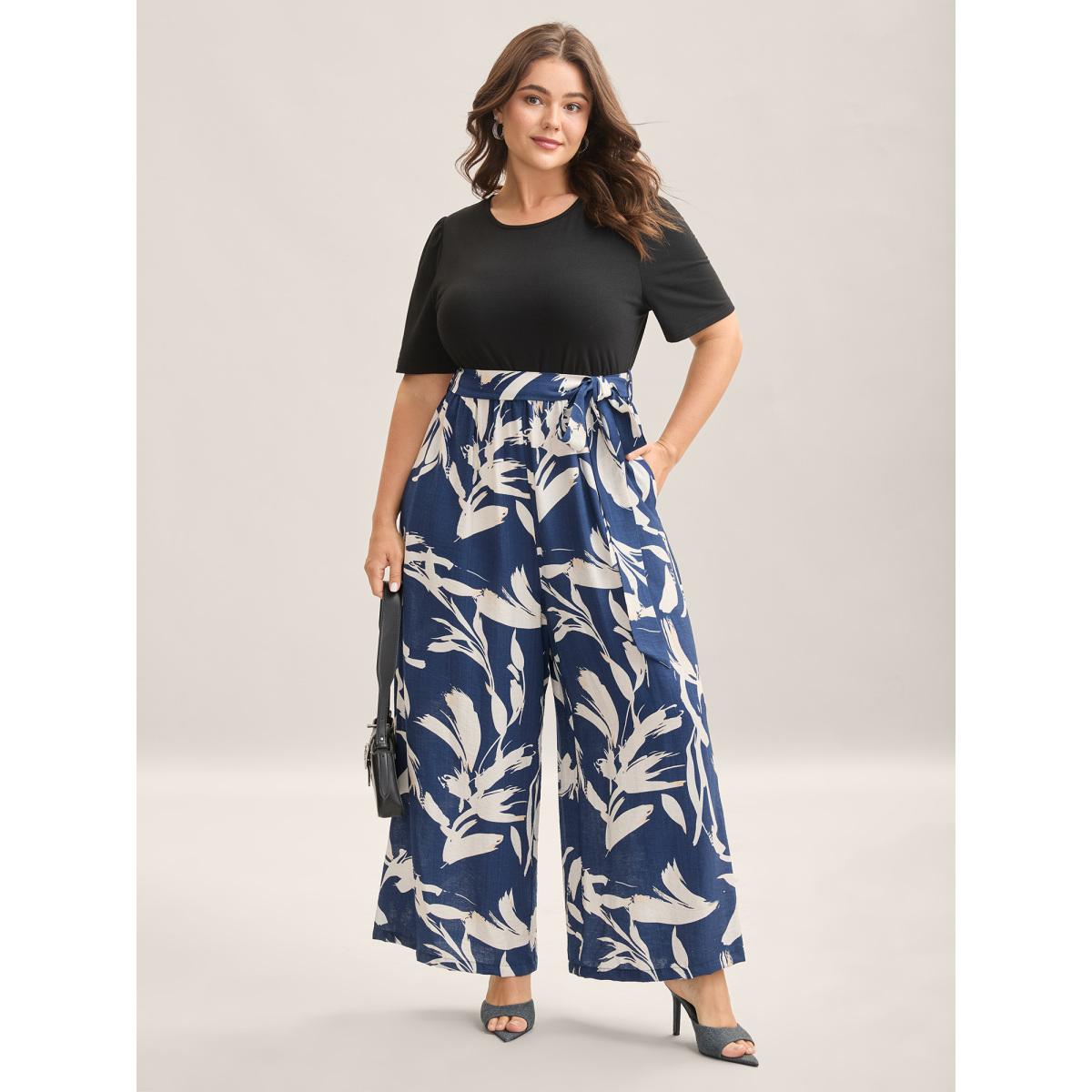Plus Size Black Feather Print Contrast Pockets Belted Jumpsuit Women Short sleeve Round Neck Work Loose Jumpsuits BloomChic 14-16/1X Product Image