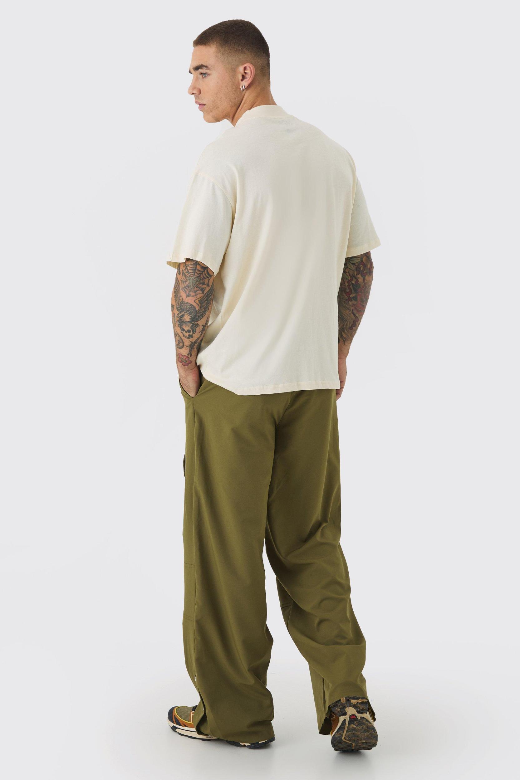 Elasticated Wide Leg Nylon Popper Hem Pants | boohooMAN USA Product Image