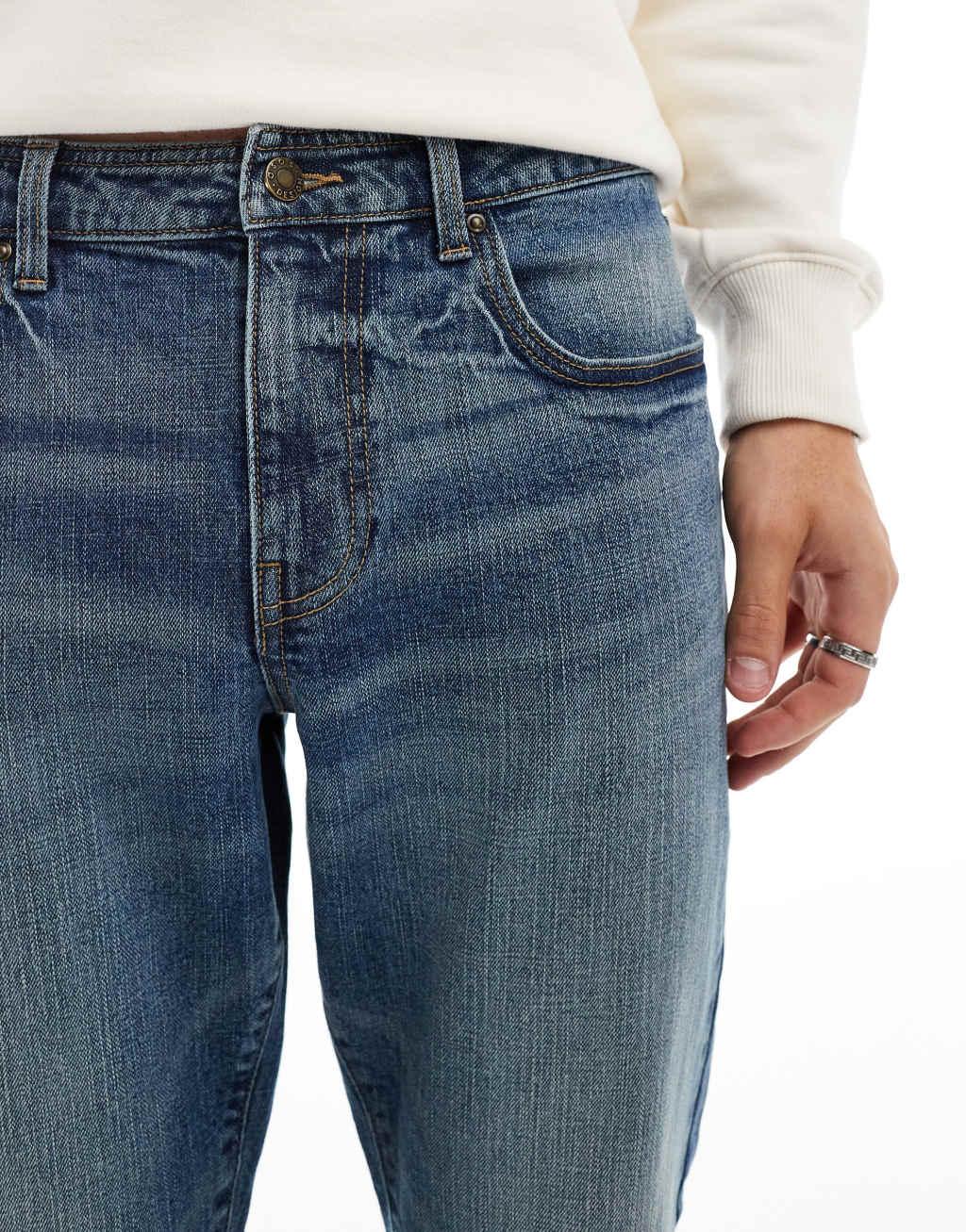 ASOS DESIGN slim jeans in mid wash blue with tint Product Image