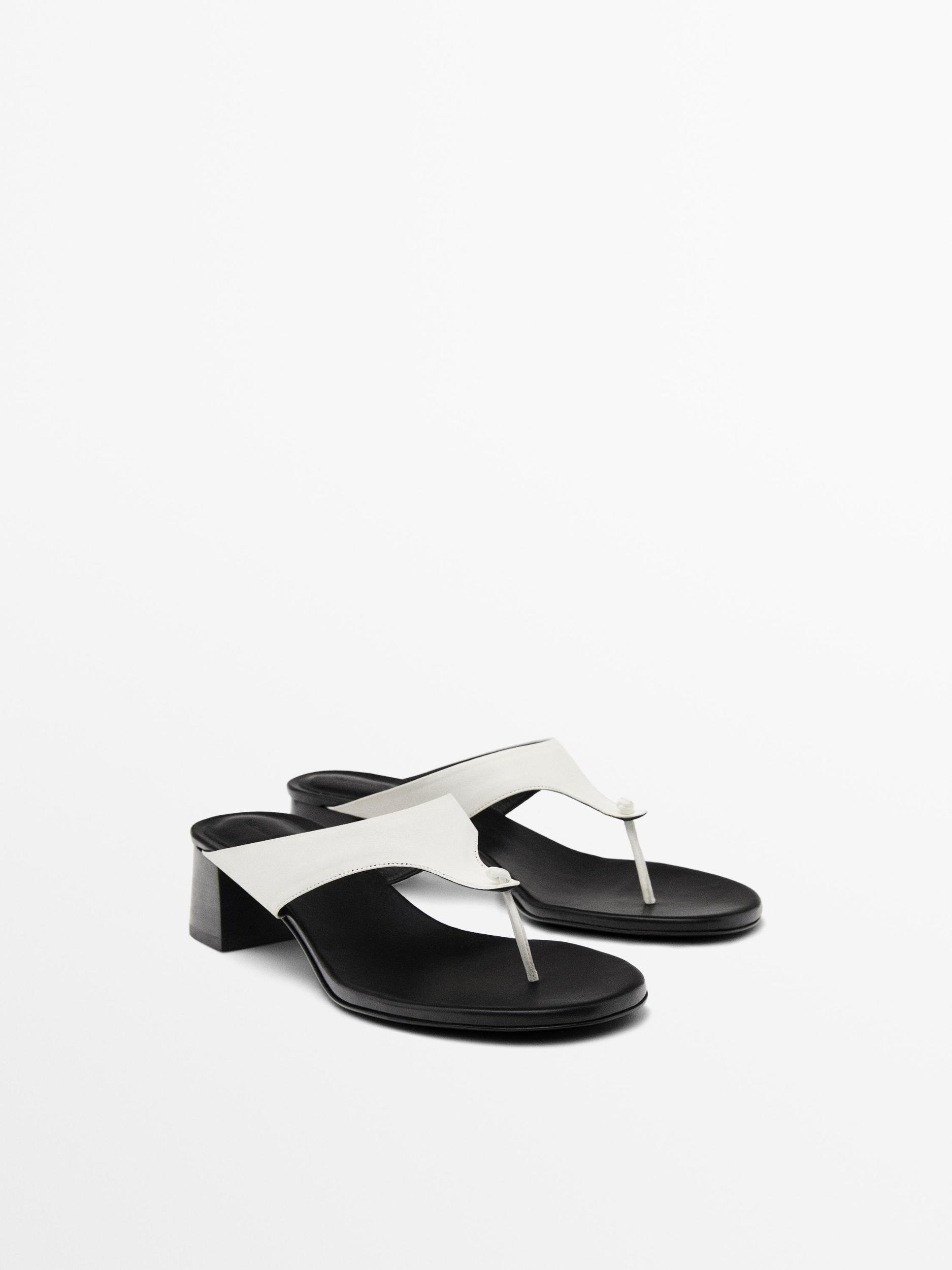 Heeled sandals with toe divider Product Image