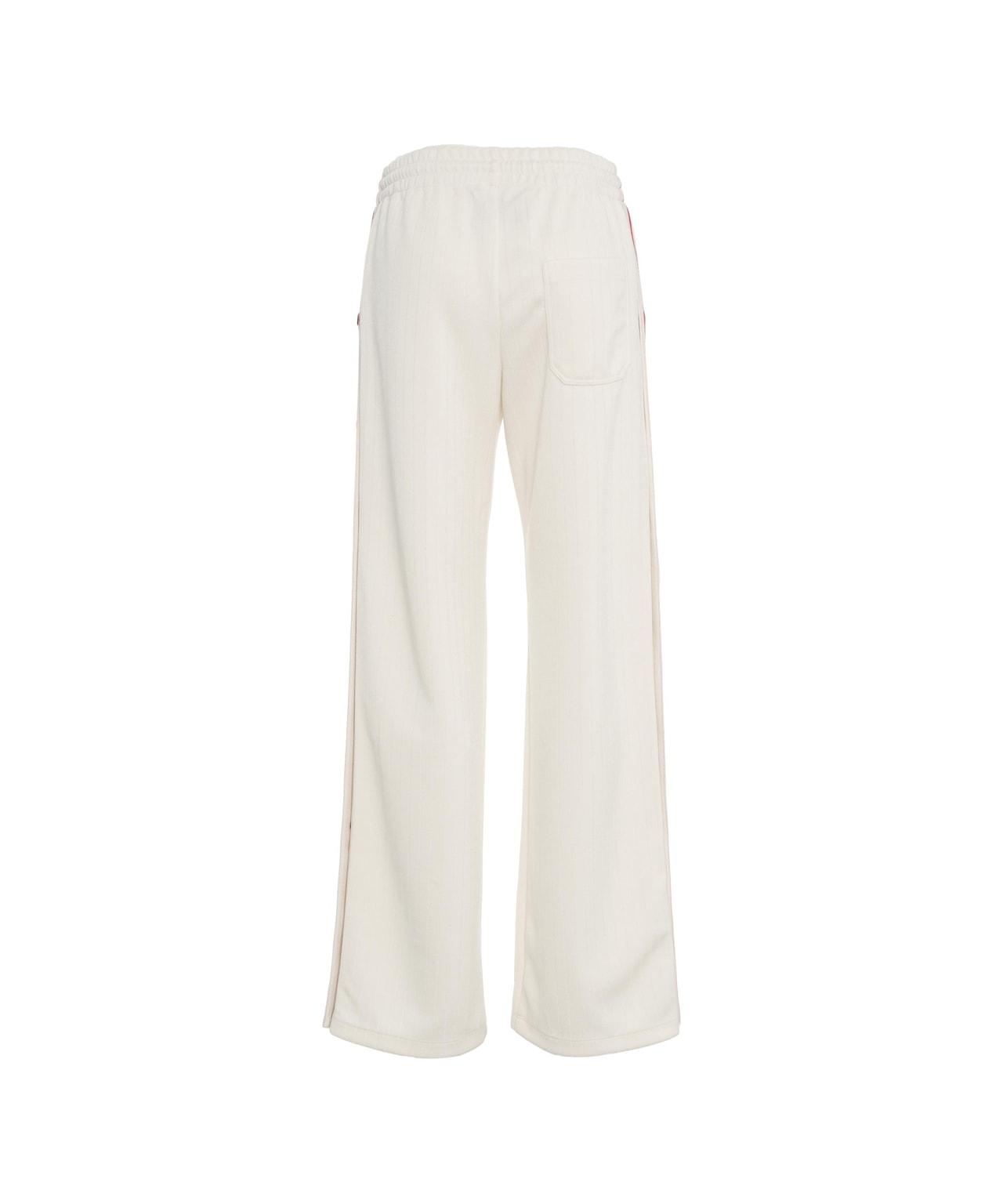 Joggers with side buttons Product Image