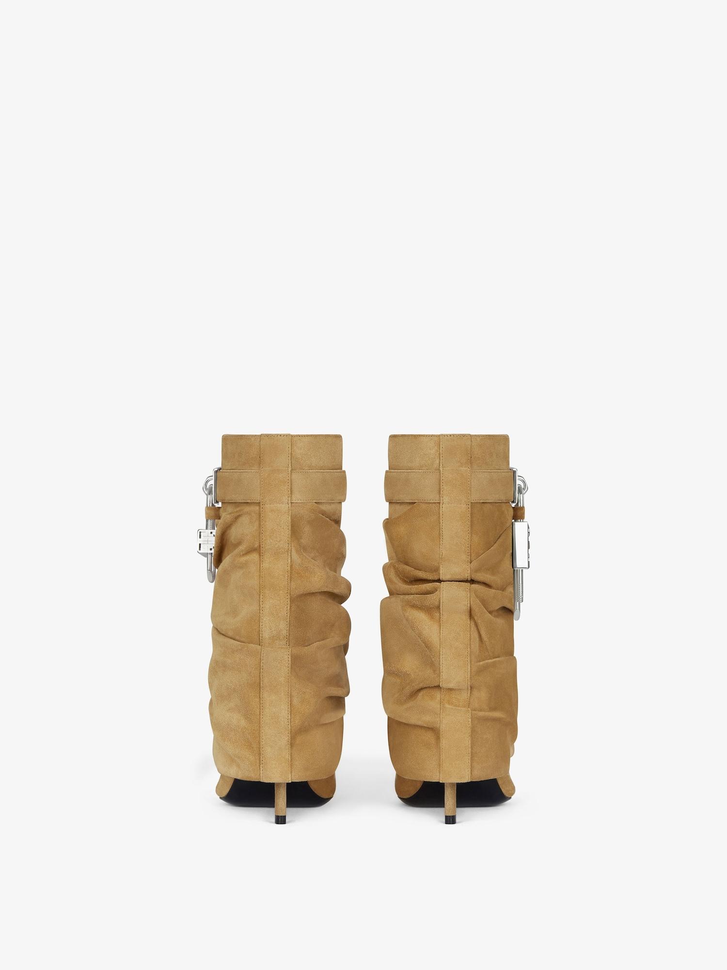 Shark Lock Stiletto ankle boots in suede Product Image