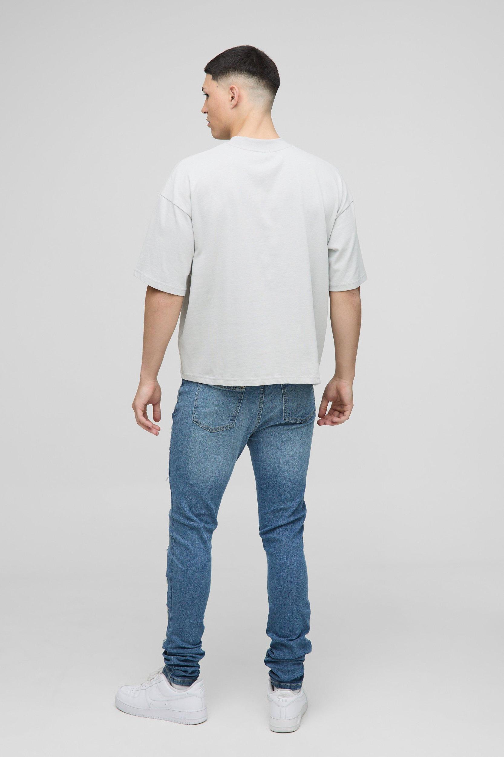 Skinny Stretch Washed Stacked Ripped Jeans | boohooMAN USA Product Image