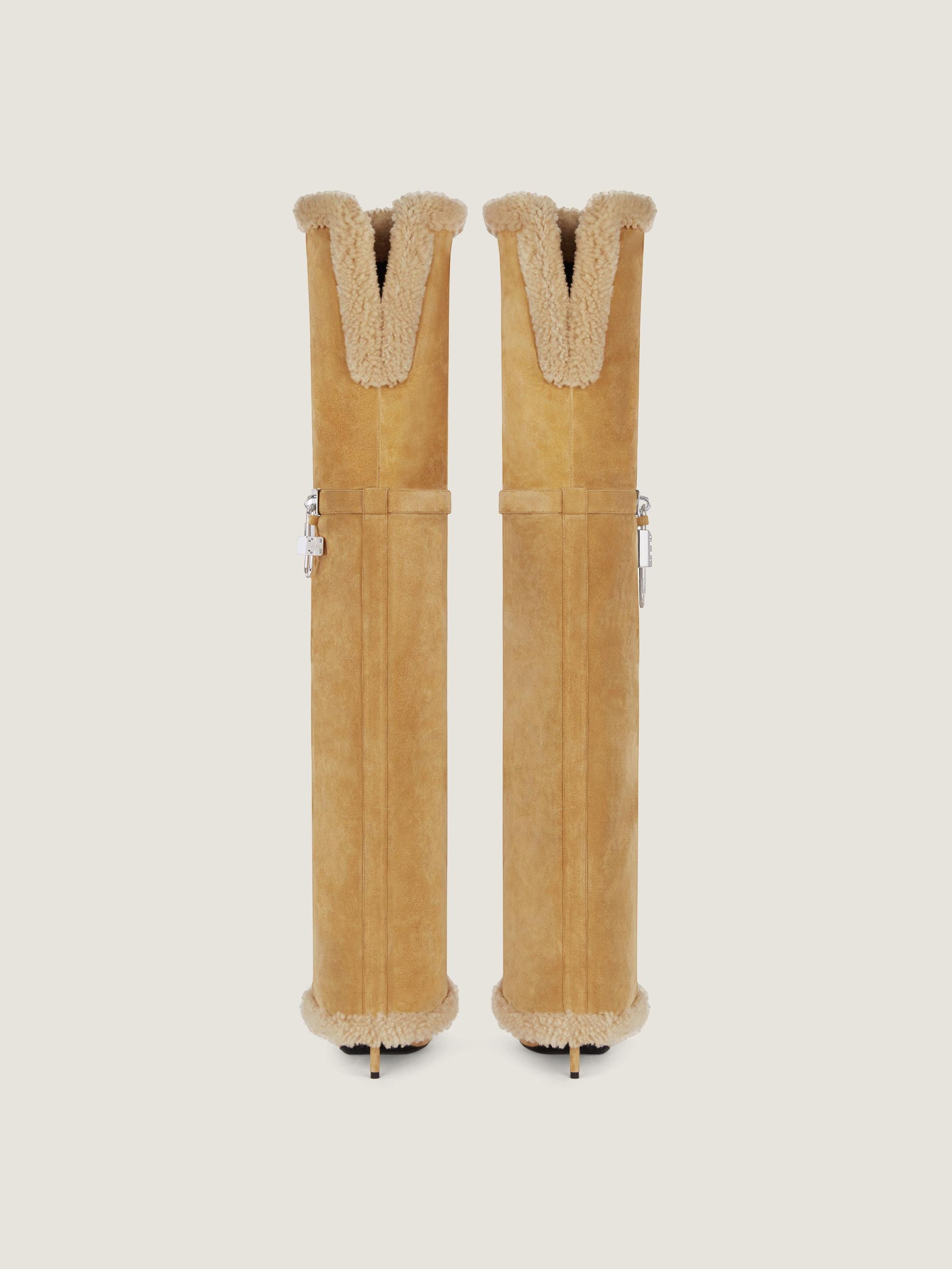 Shark Lock Stiletto boots in suede and shearling Product Image