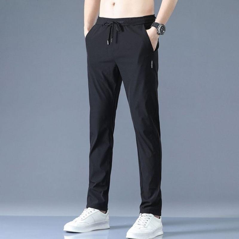 Drawstring Waist Applique Tapered Pants Product Image
