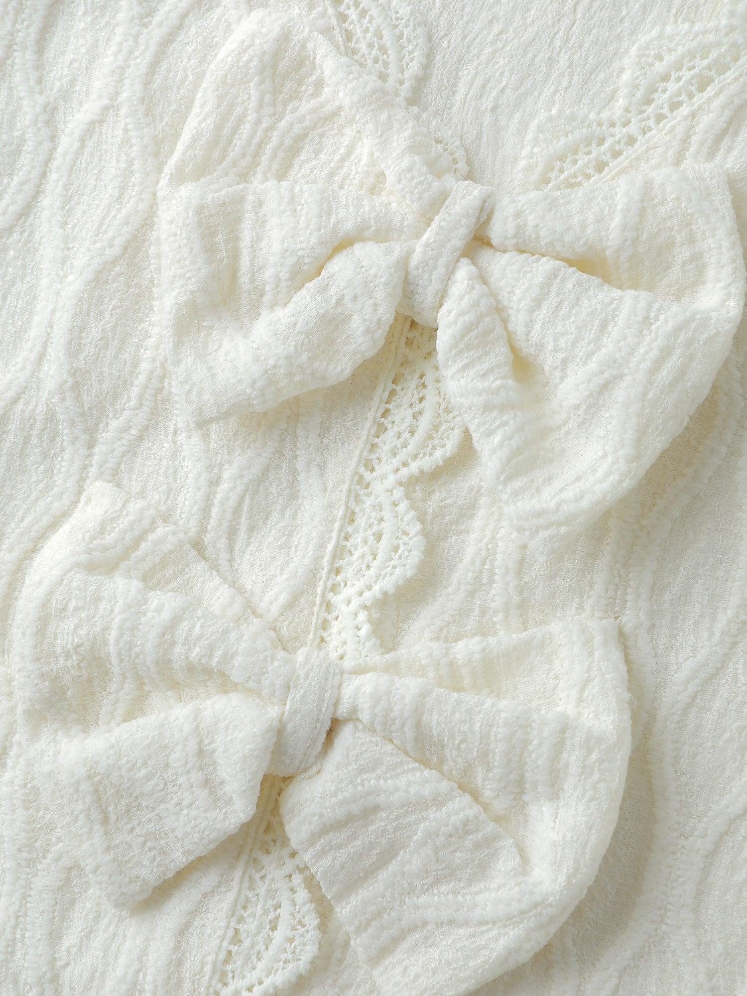 Stretchy Textured Back Bowknot Cut-Out Top Female Product Image