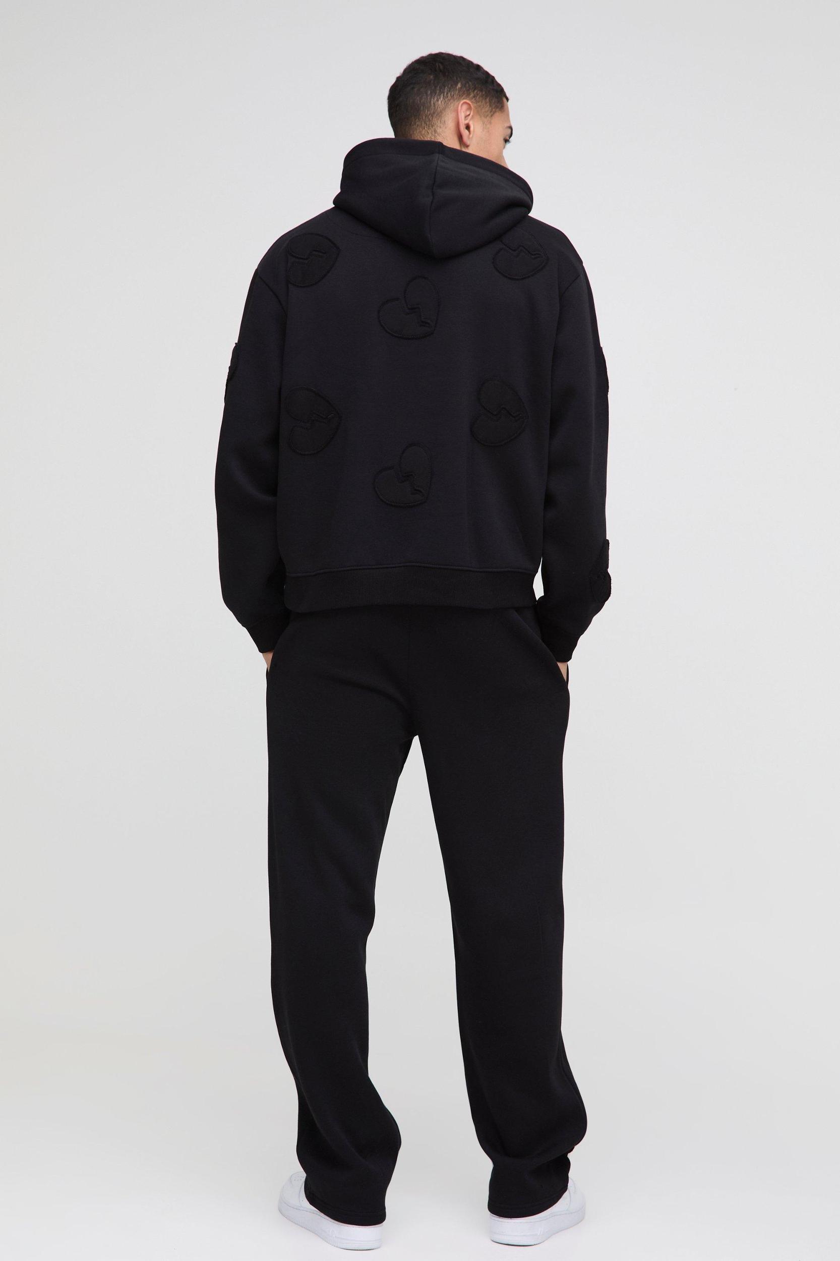 Oversized Boxy All Over Heart Applique Tracksuit | boohooMAN USA Product Image