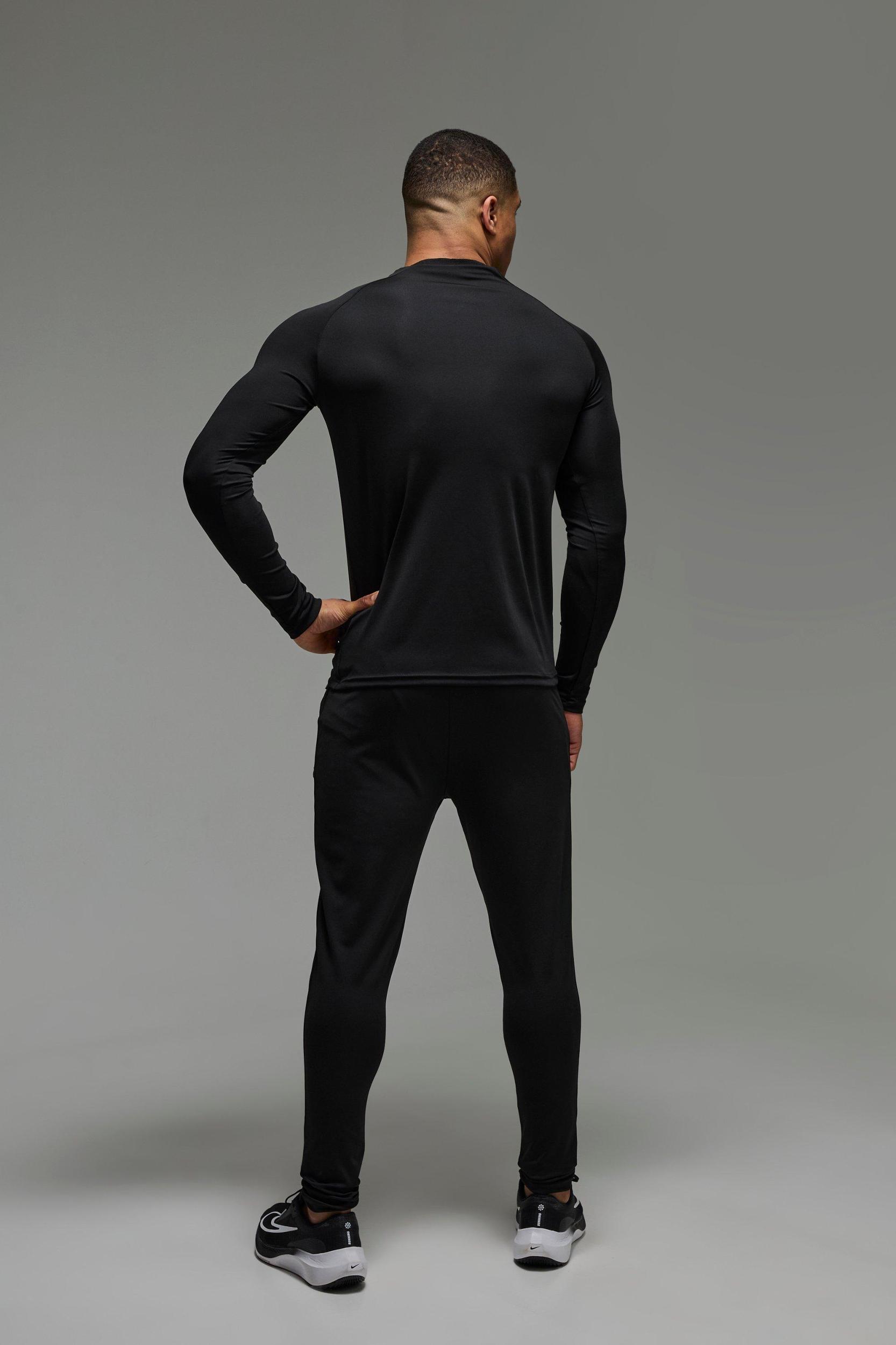 Man Active Muscle Fit Crew Neck 1/4 Zip Tracksuit | boohooMAN USA Product Image