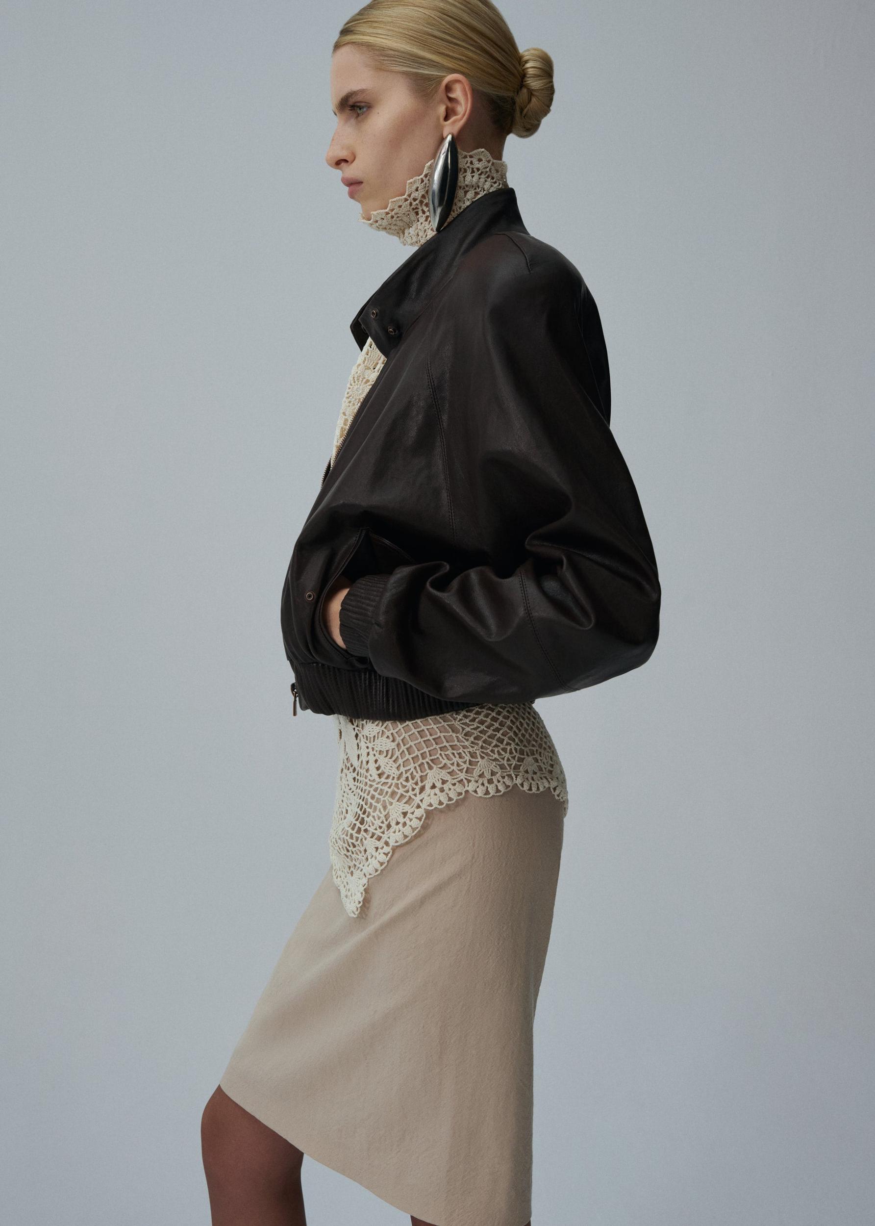 Cropped leather bomber jacket in brown Product Image