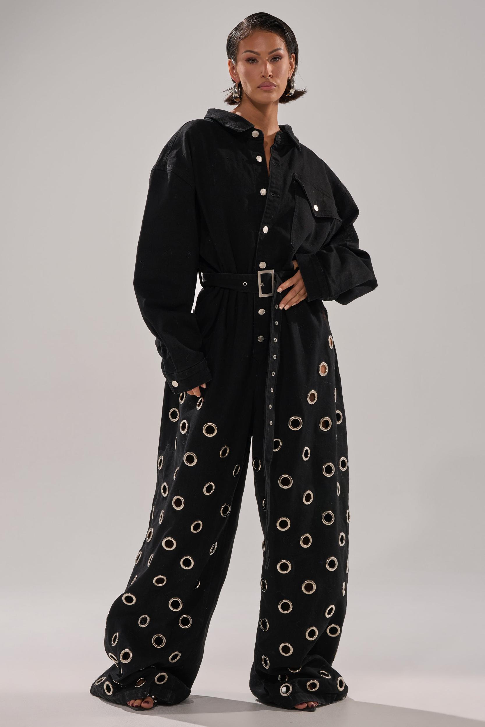 PLAY YOUR CARDS RIGHT DENIM JUMPSUIT WITH GROMMETS Product Image