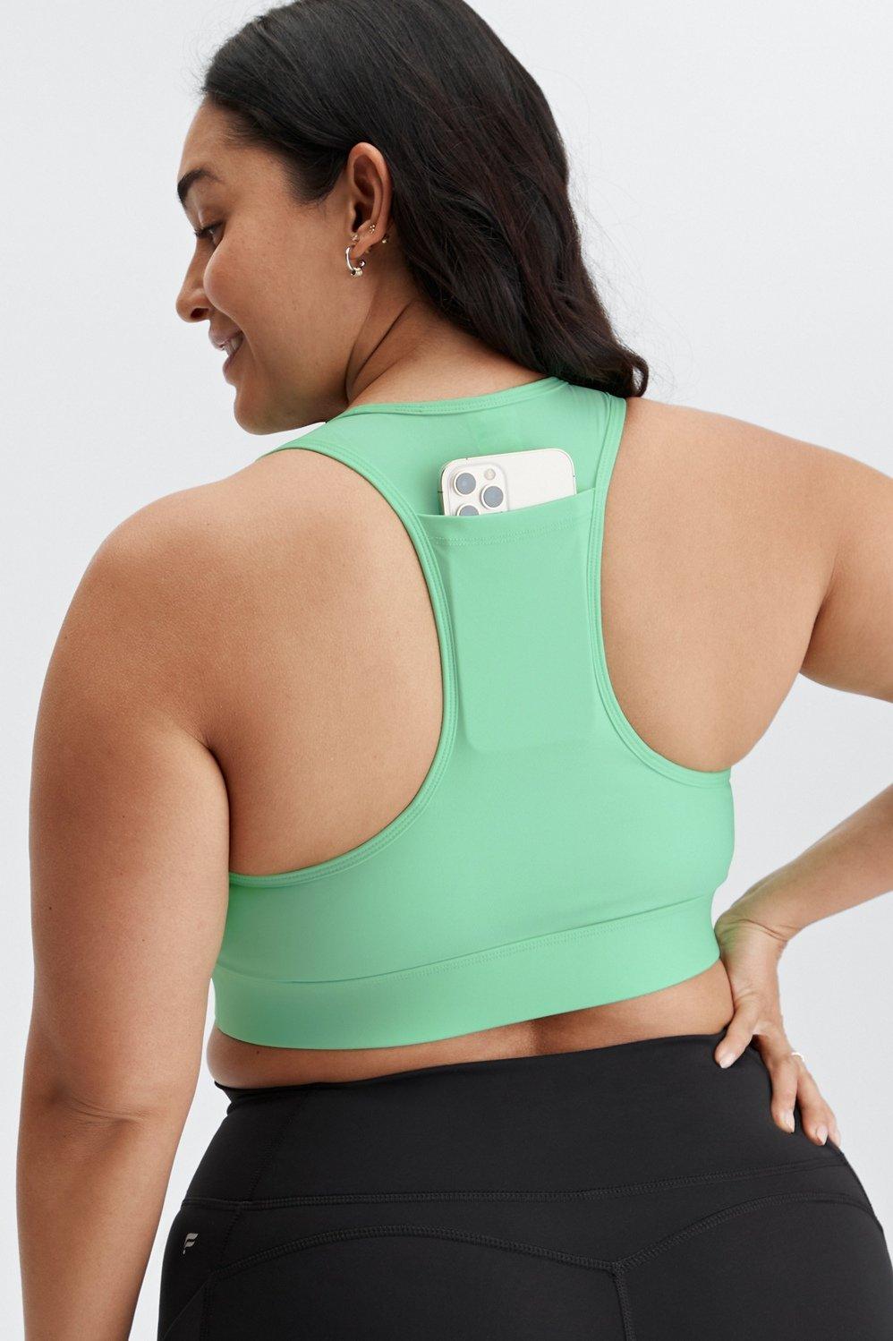 Fabletics On-the-Go Medium-Impact Sports Bra Womens green Size S Product Image