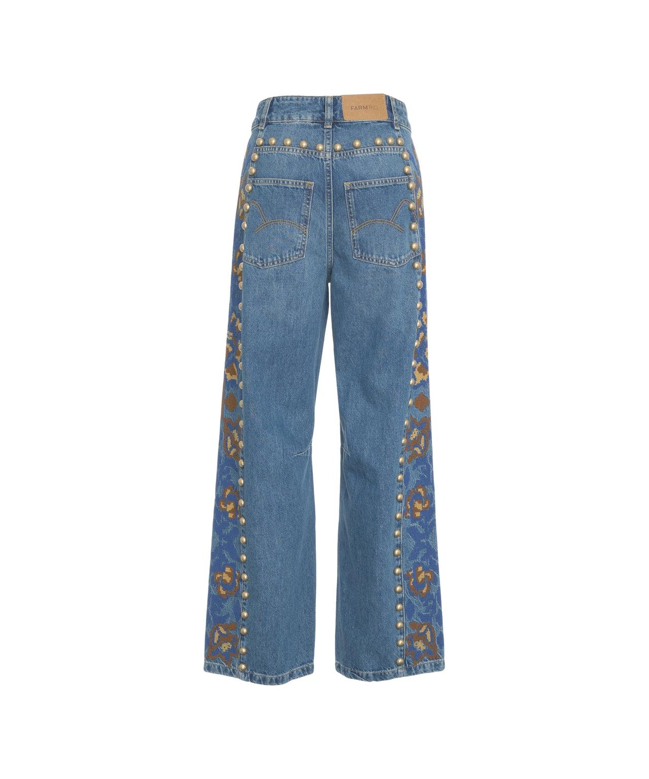 Jeans with studs and floral print Product Image
