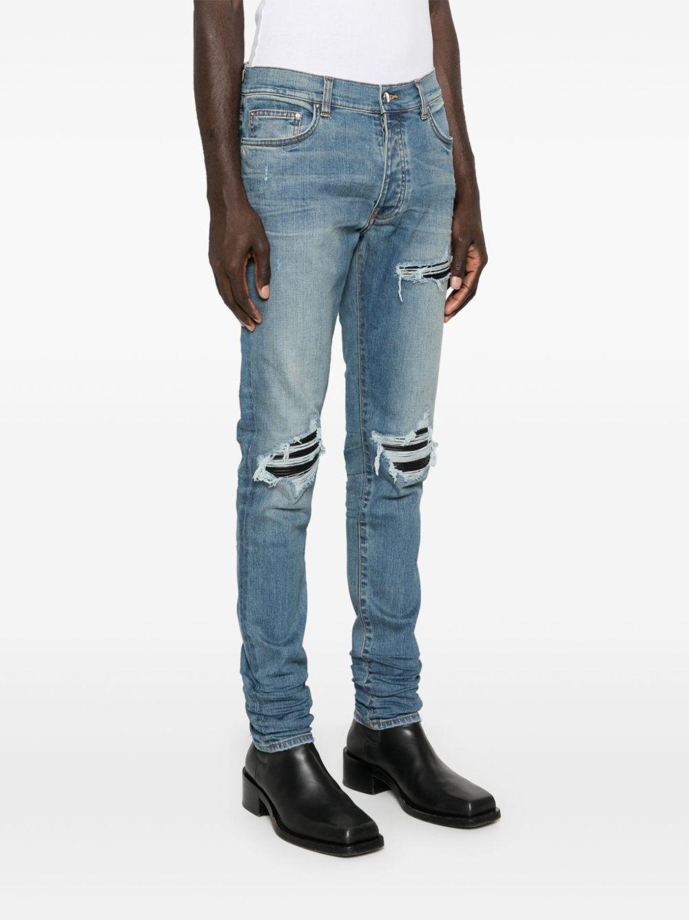 MX1 distressed-effect skinny jeans Product Image