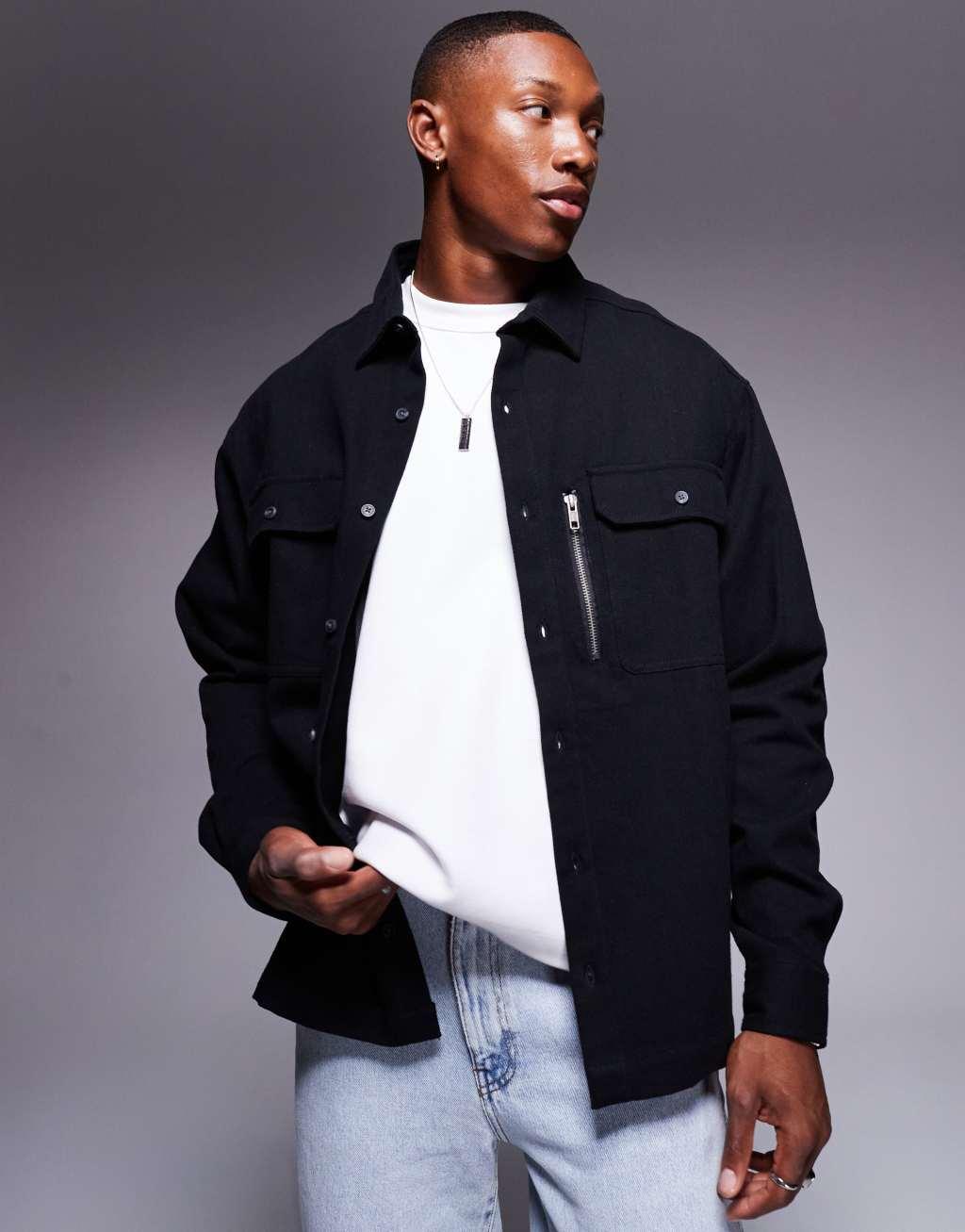 ASOS DESIGN oversized boxy shirt with patch pockets in black Product Image