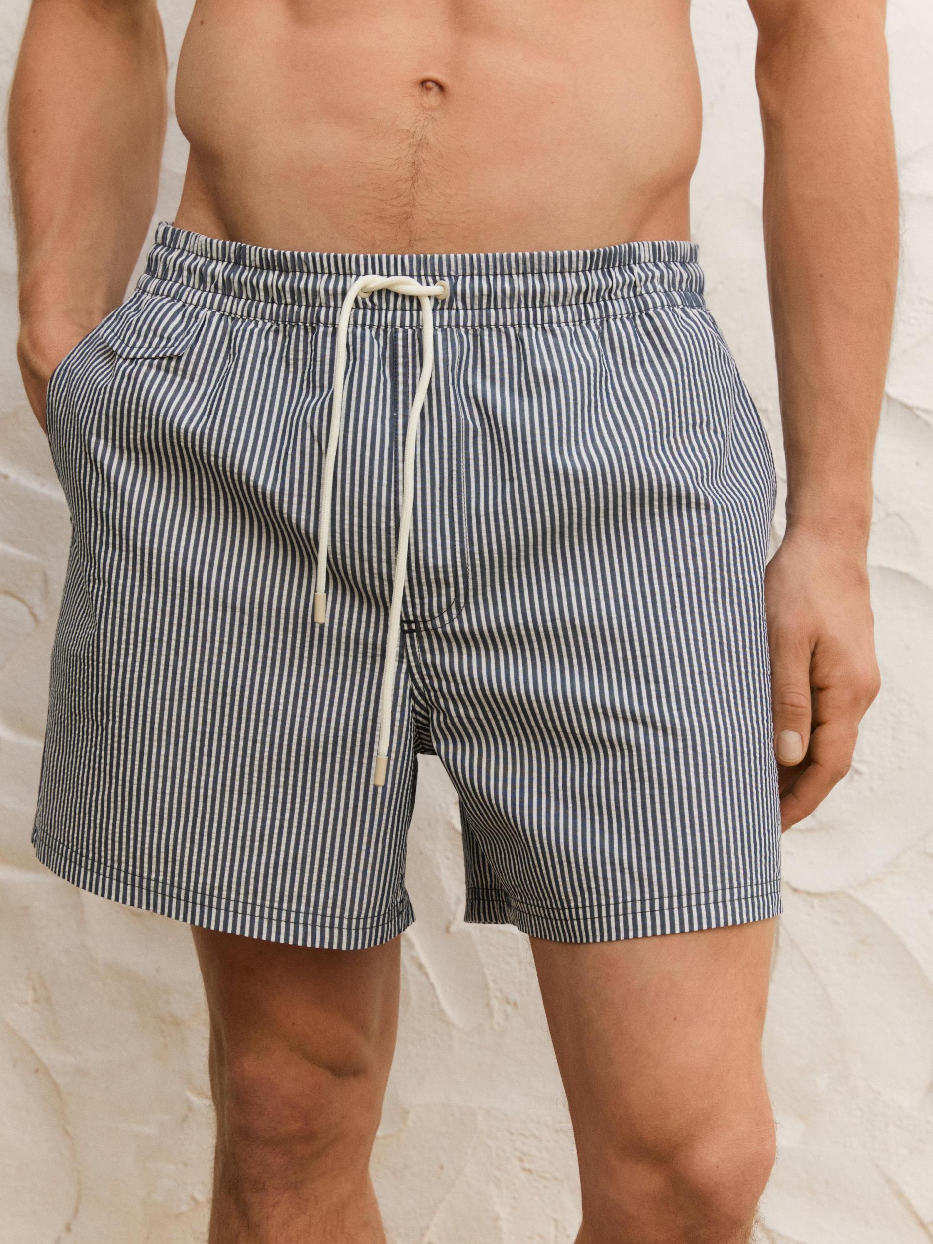 Striped seersucker swimming trunks Product Image