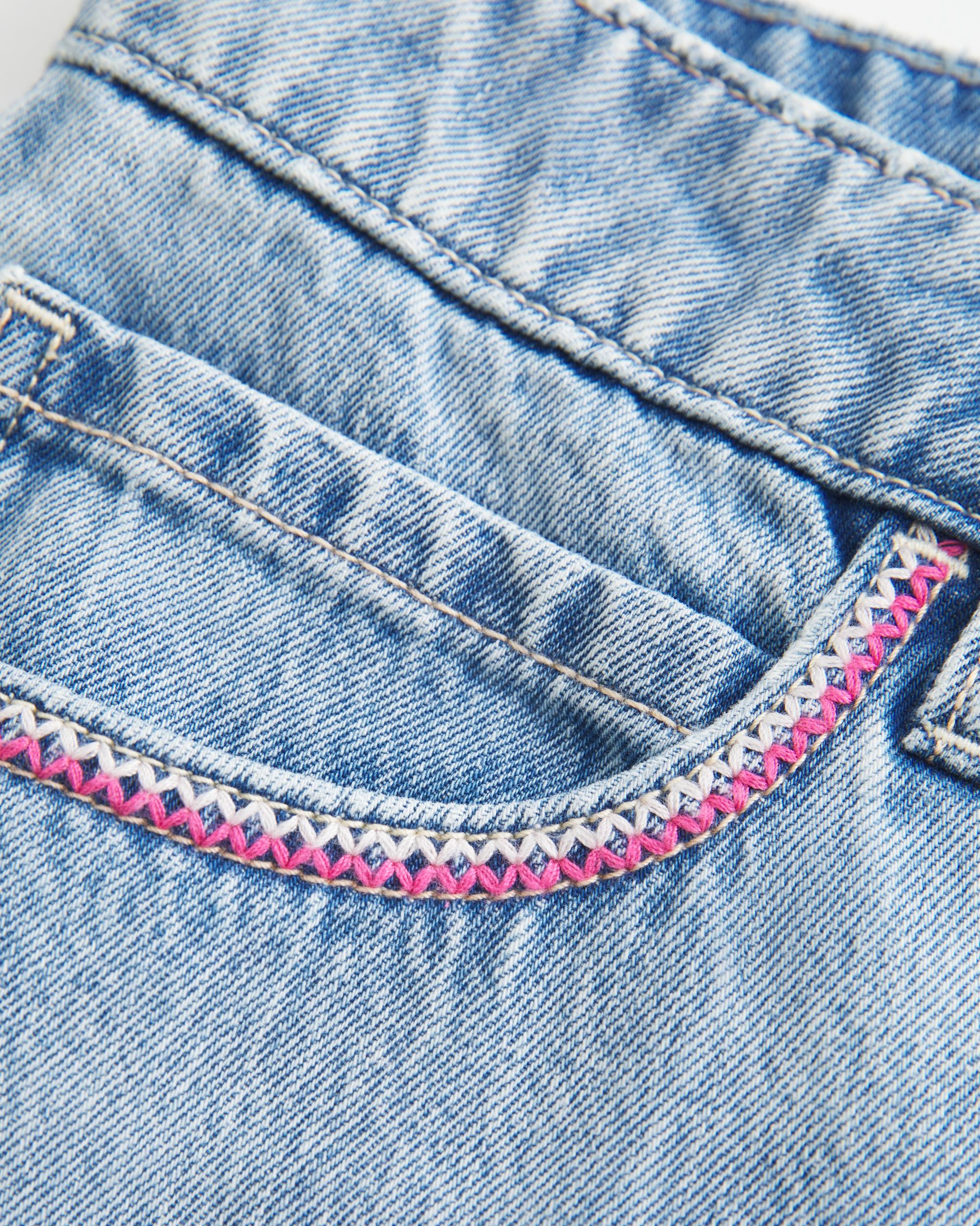 Low-Rise Medium Wash Star Applique Denim Mini Skort Product Image