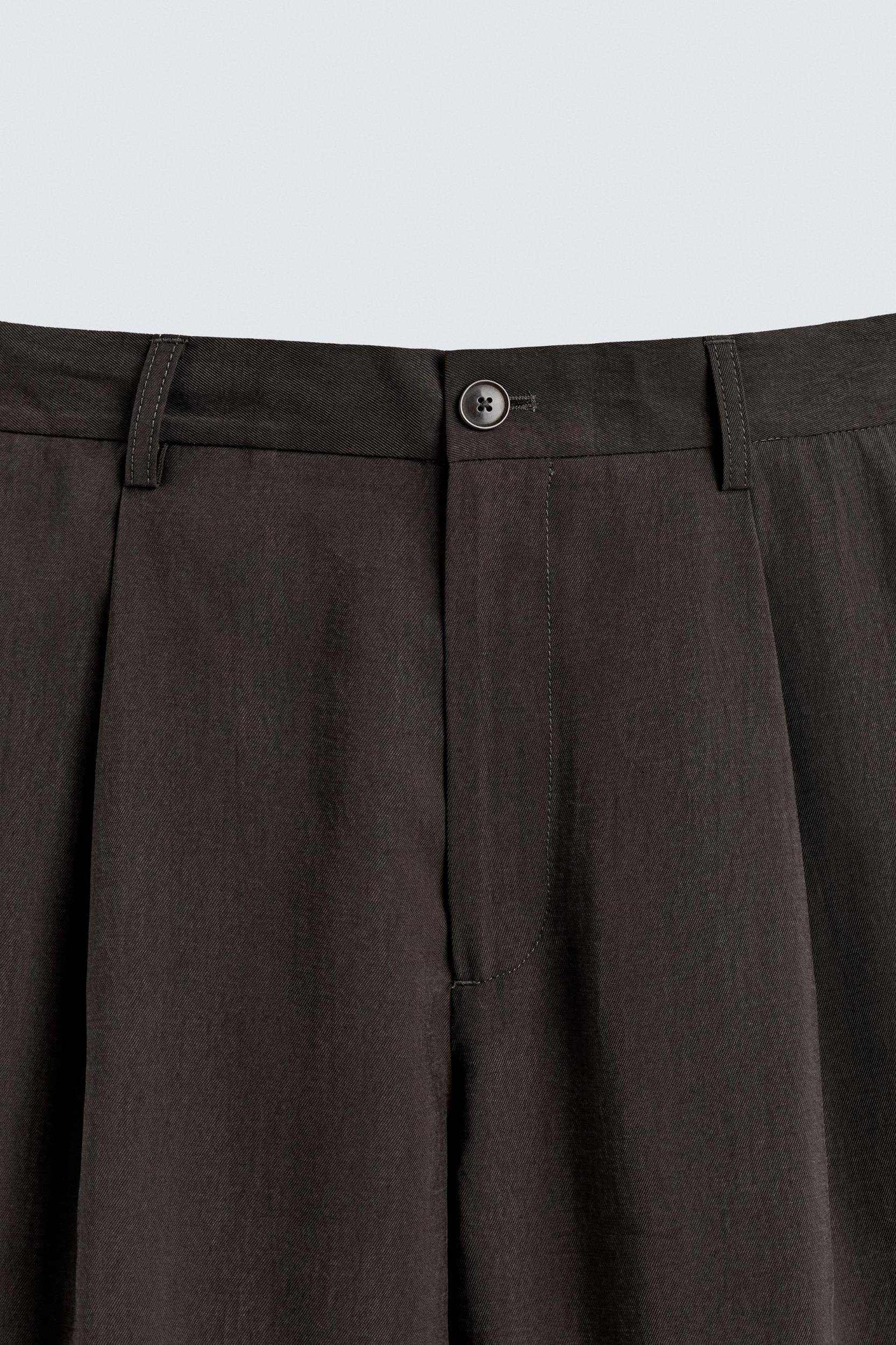 PLEATED FLOWY PANTS Product Image