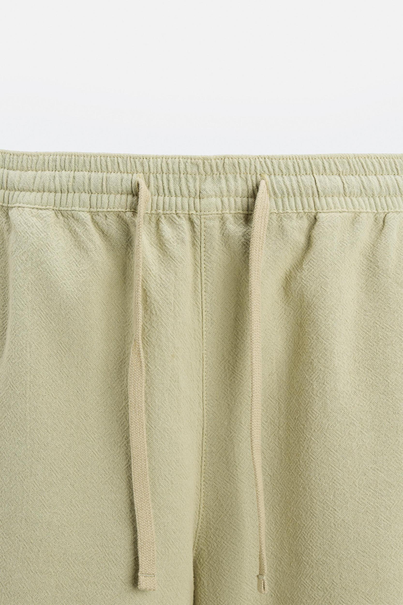 TEXTURED EMBROIDERED SHORTS Product Image
