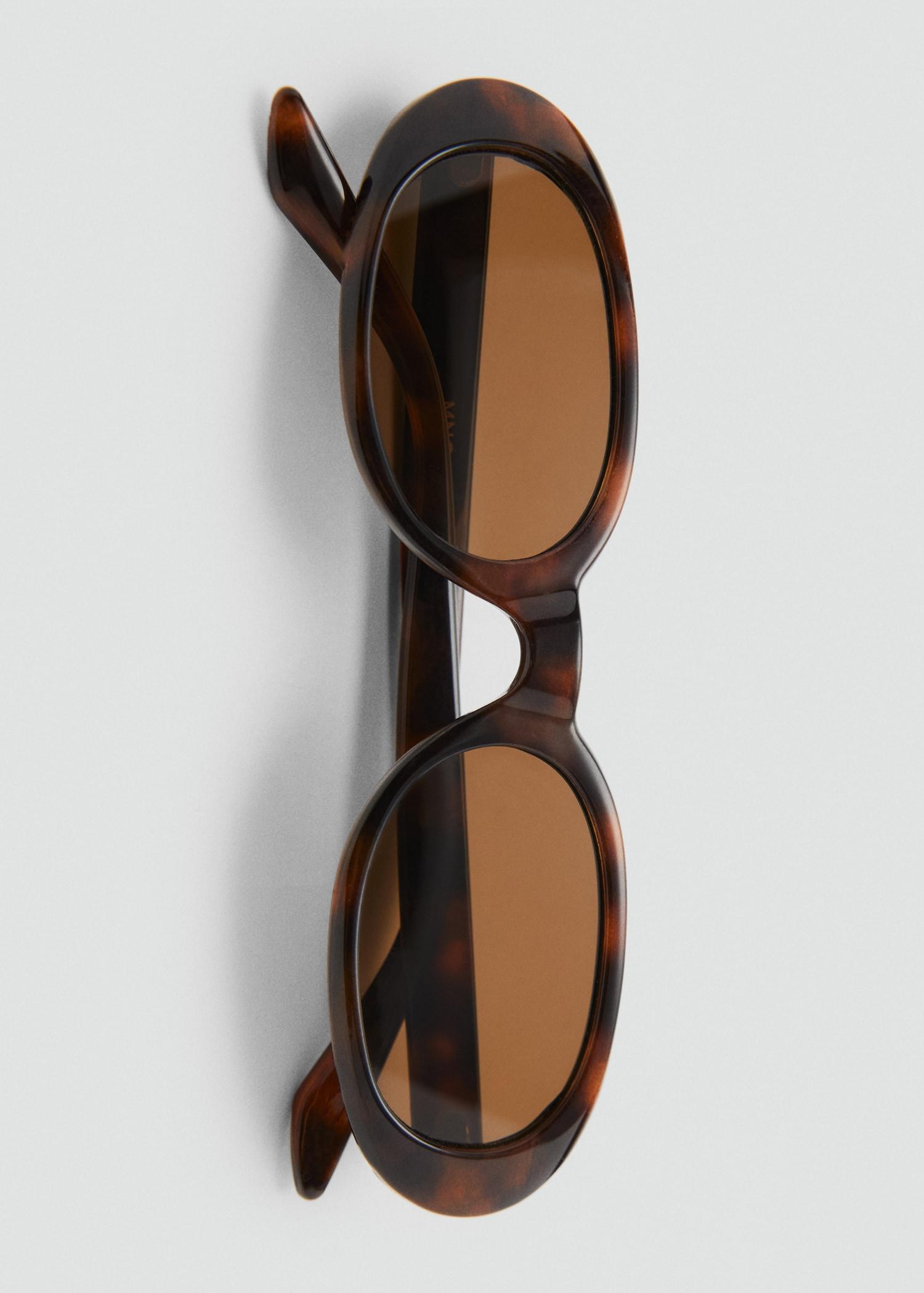 Oval-frame sunglasses - Women | MANGO USA Product Image