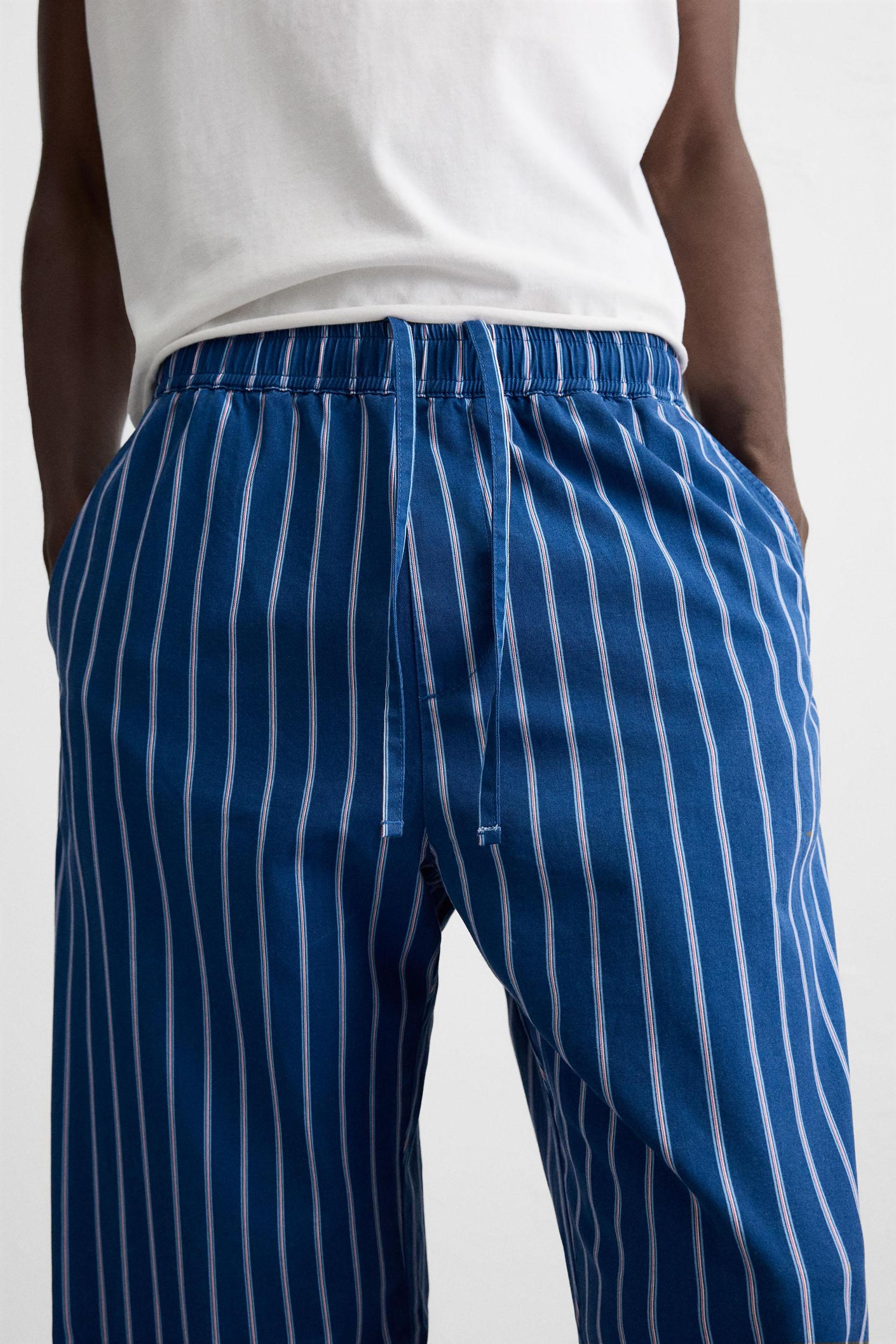 STRIPED RELAXED FIT PANTS Product Image