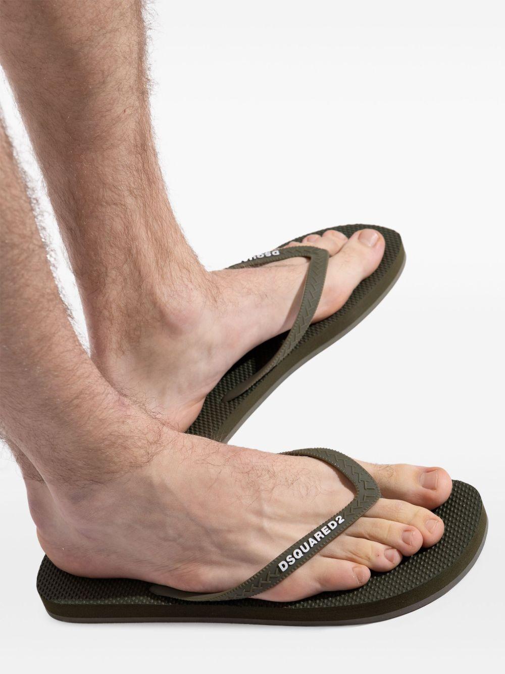 logo-embossed flip flops  Product Image