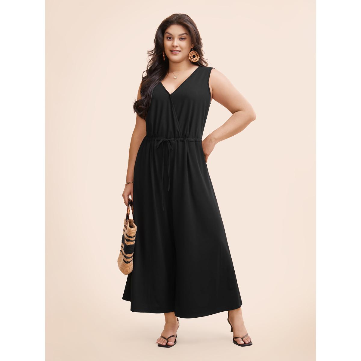 Plus Size Black Solid Overlap Collar Drawstring Jumpsuit Women Elegant Sleeveless Overlap Collar Everyday Loose Jumpsuits BloomChic 14-16/1X Product Image