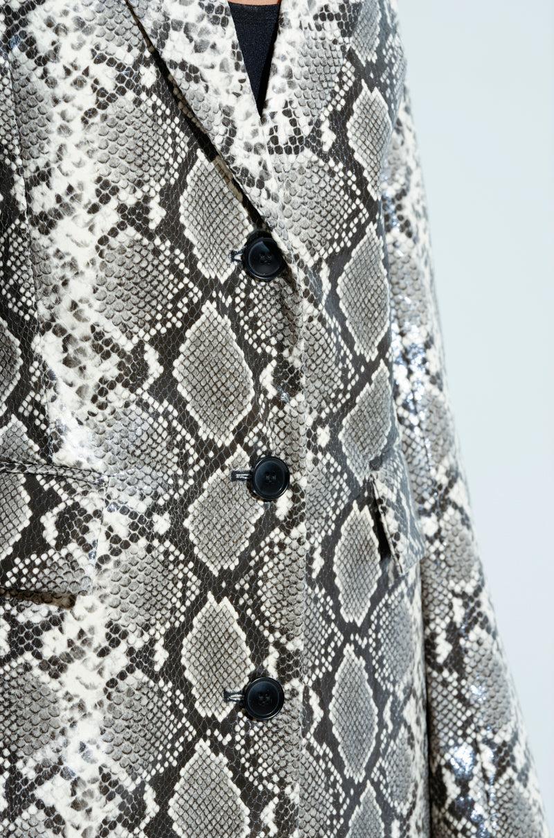 INCOGNITO SNAKE PRINT TRENCH IN IVORY Product Image